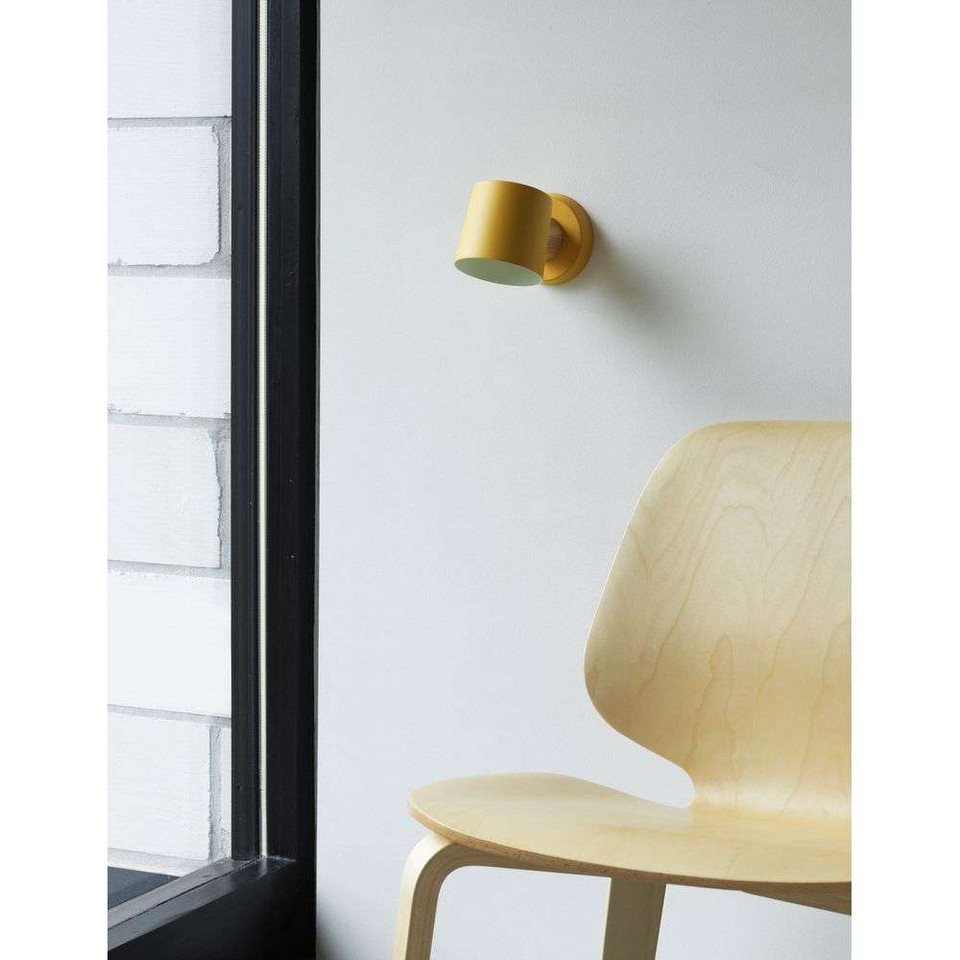 Normann Copenhagen Rise Vägglampa Hardwired, gul från Normann Copenhagen