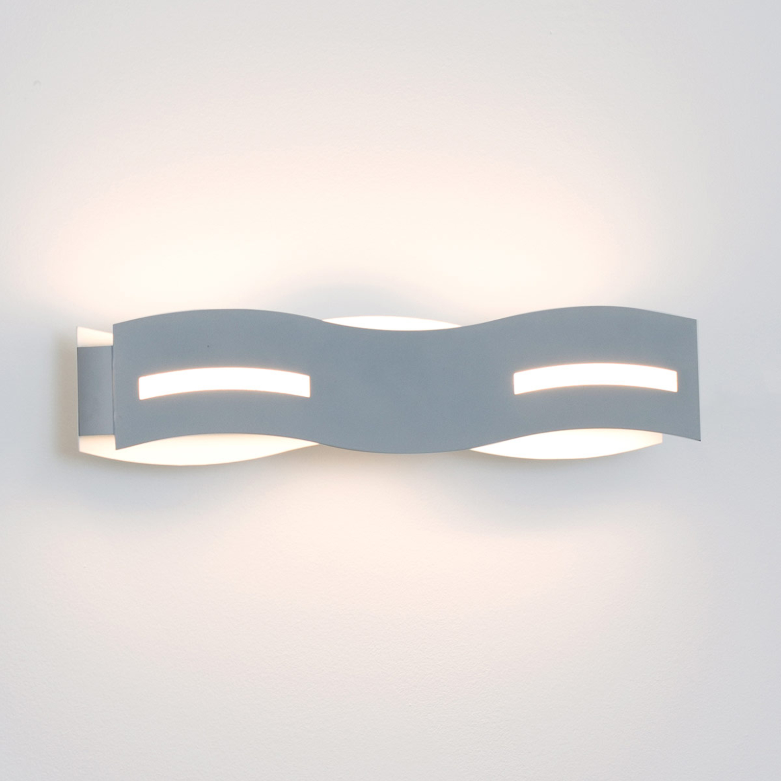 Wave LED wall light in wave form