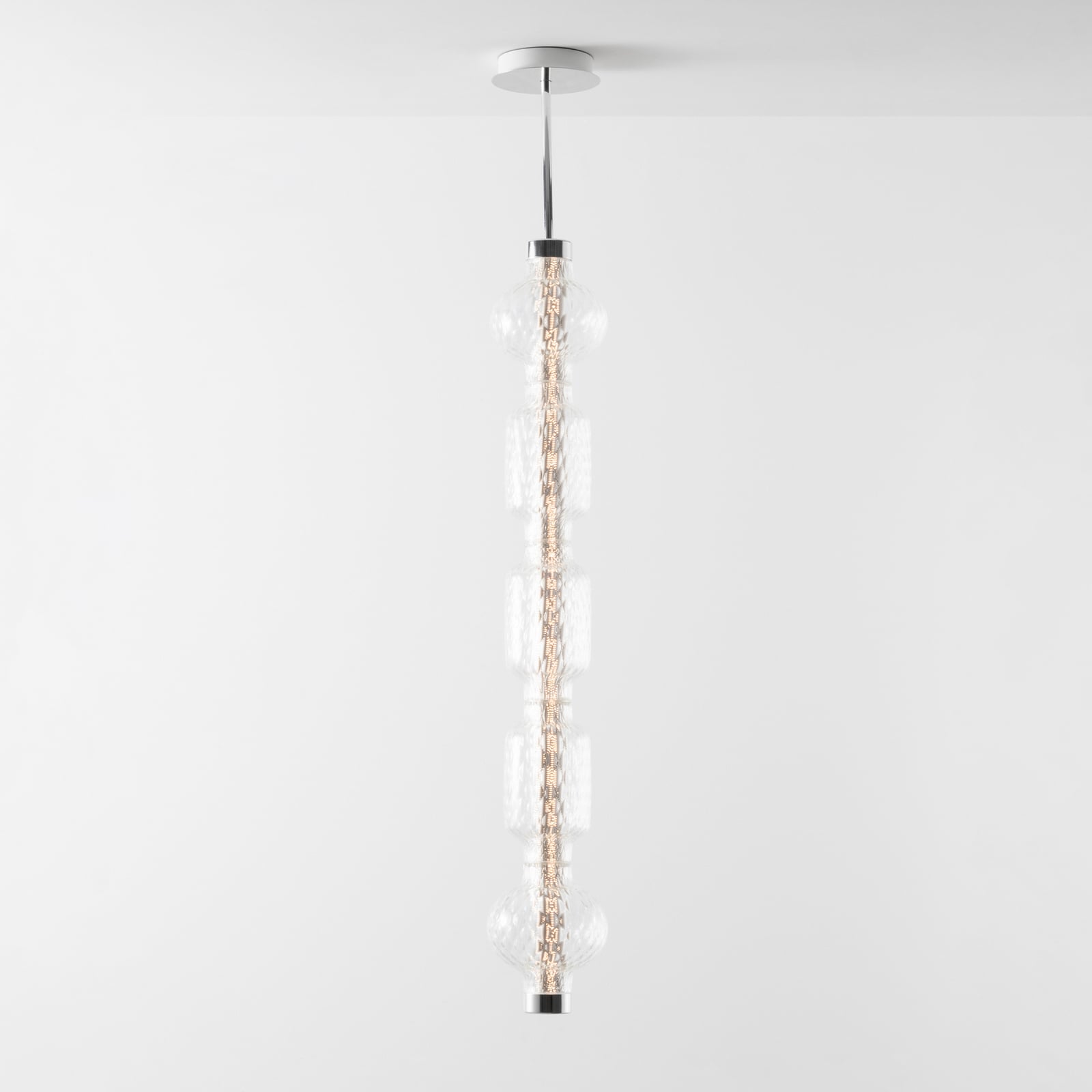 Candeeiro suspenso LED Alambicco Vertical App da Artemide, 123 cm, 2 700 K Candeeiro suspenso LED Alambicco Vertical App da Artemide, 123 cm, 2 700 K