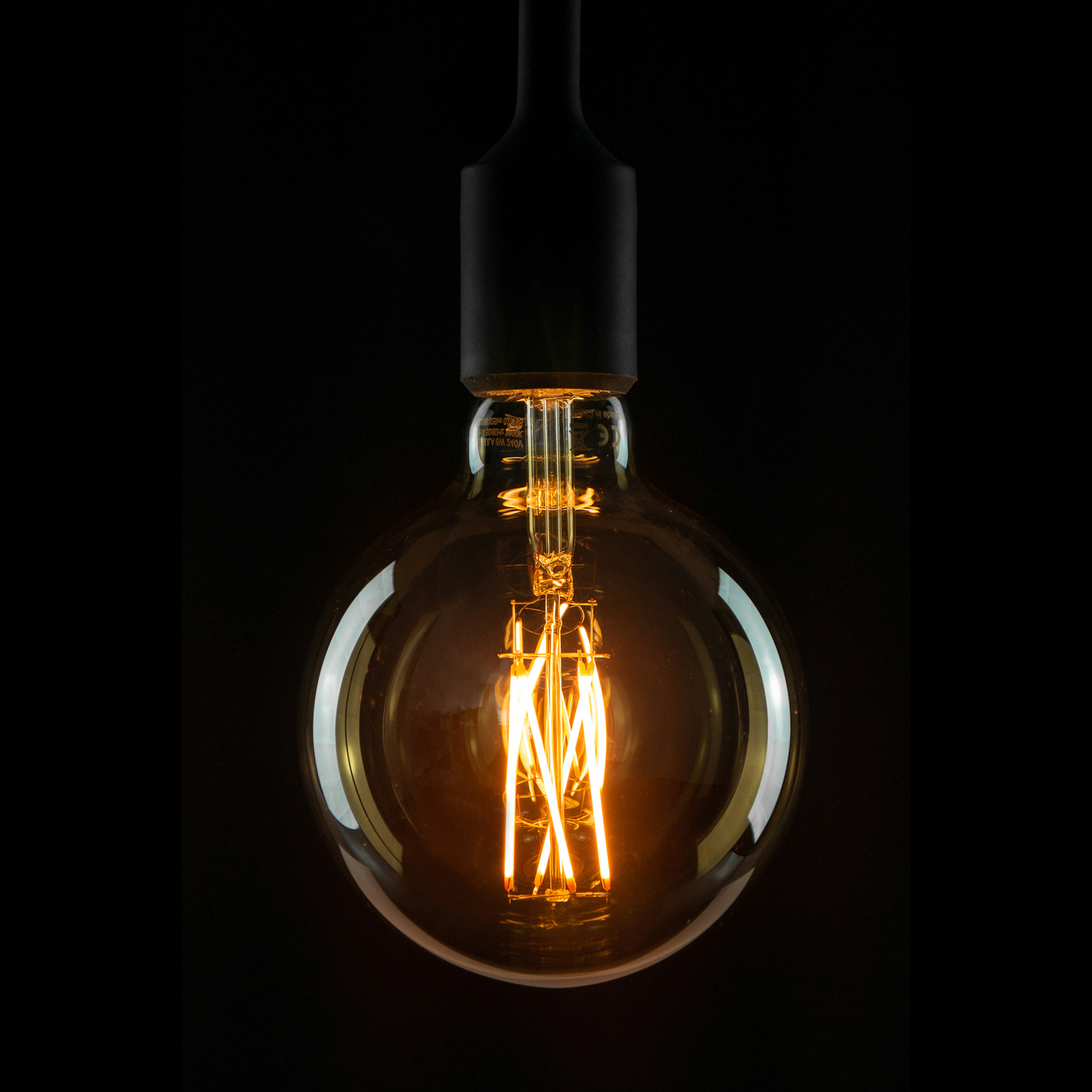 Segula lâmpada LED E27 G125 5W 2.200K ouro regulável