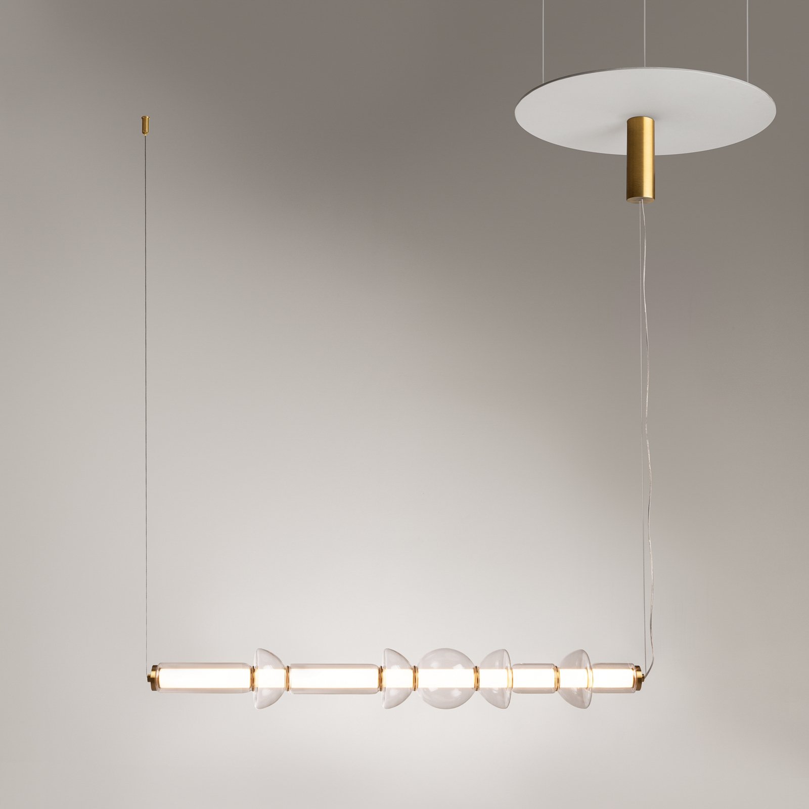 Maytoni Cosmo LED pendant light, brass, length 98 cm, glass