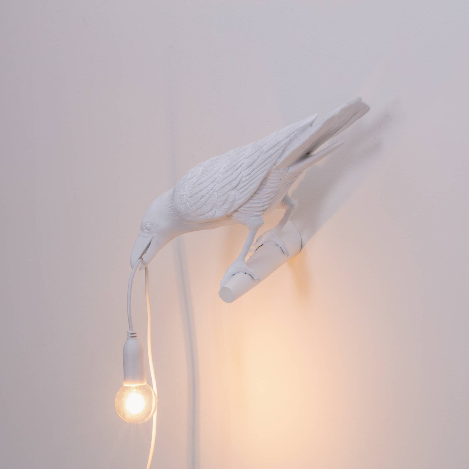 Kinkiet LED Bird Lamp, zwrócony w lewo, biały