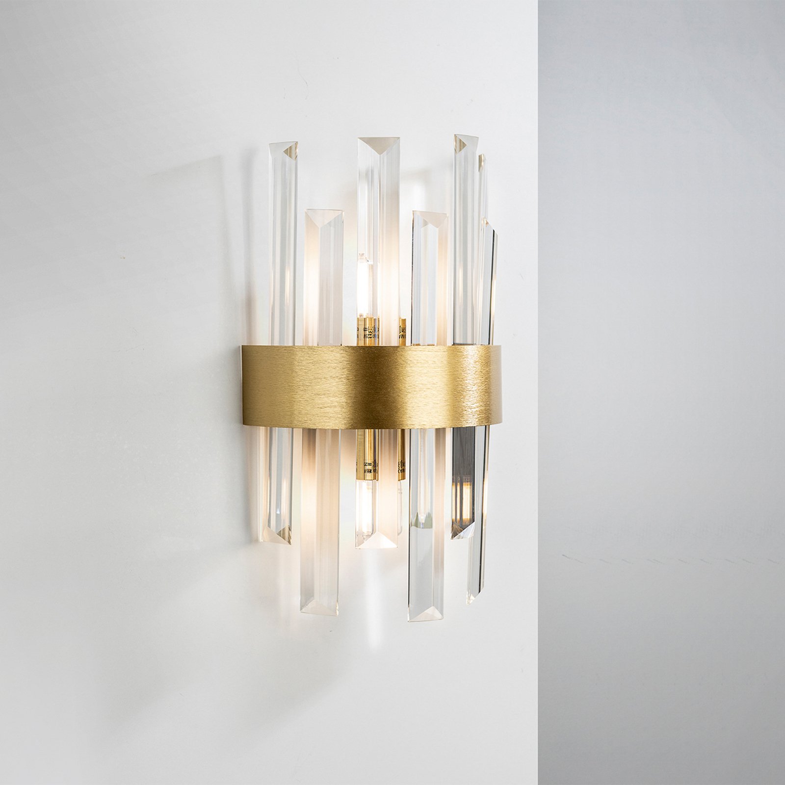 Grace vegglampe, 2 lyskilder, gullfarget, jern, glass