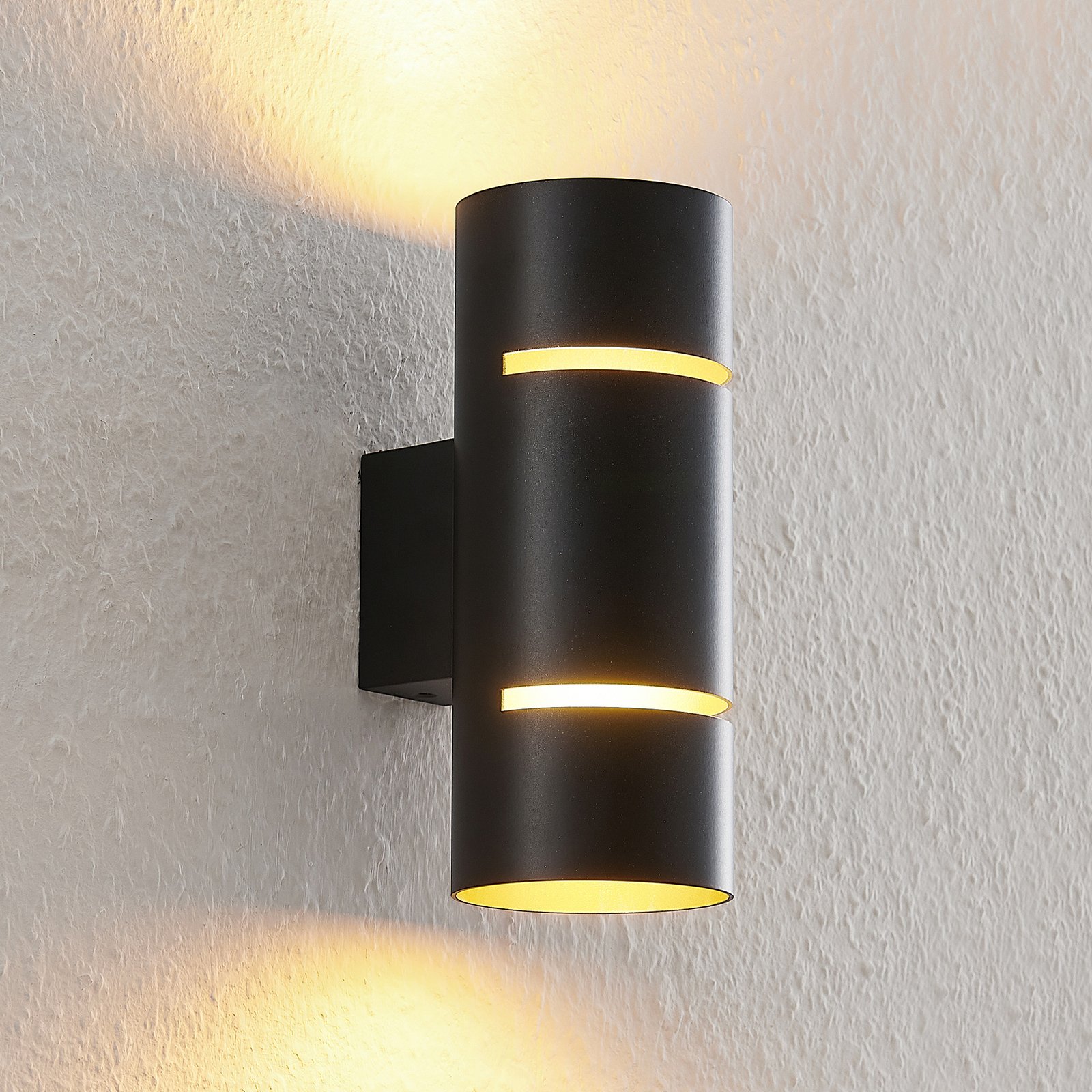 Lindby Deora LED-vägglampa, rund, svart-koppar