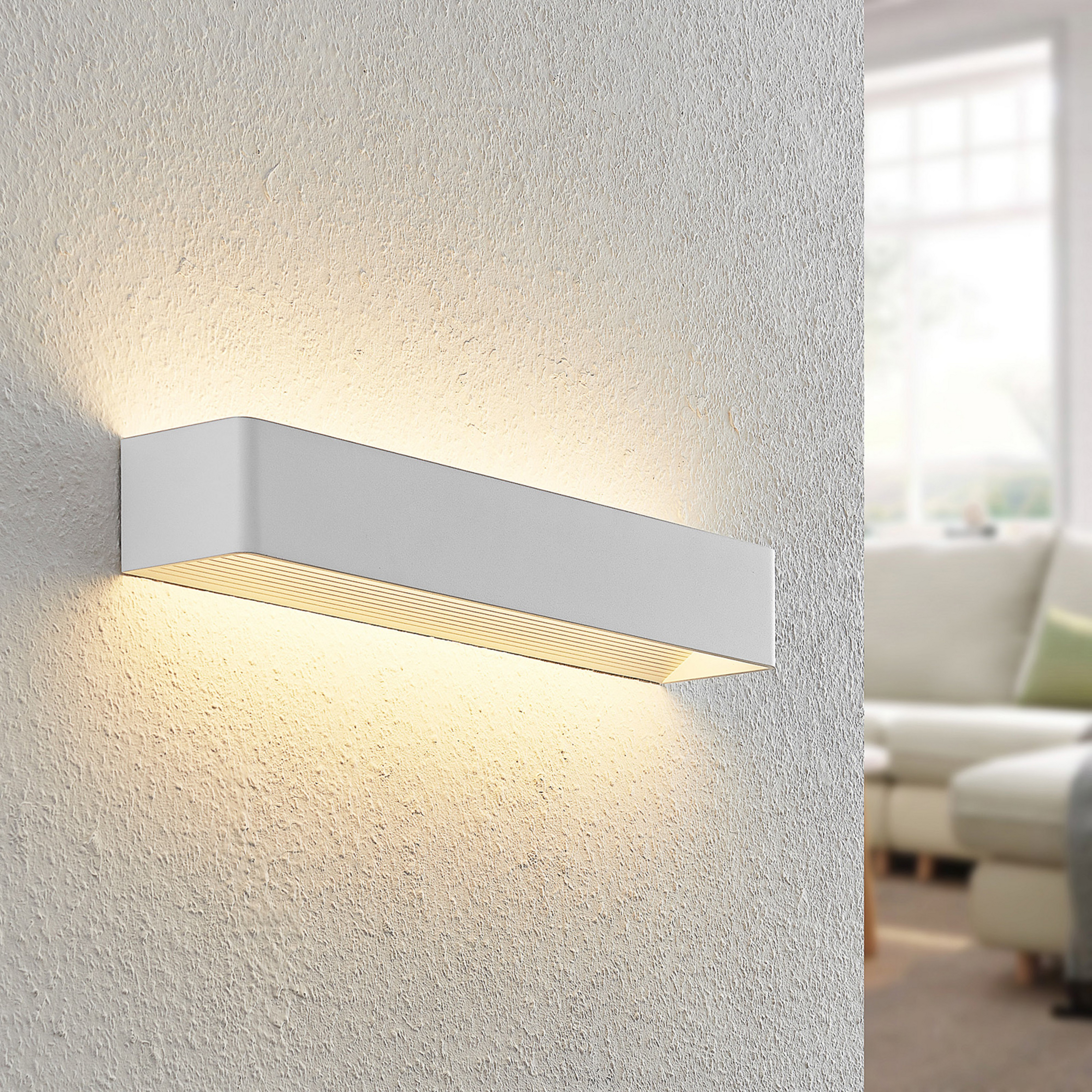 Arcchio Applique a LED Karam, 53 cm, bianco, metallo, up/down