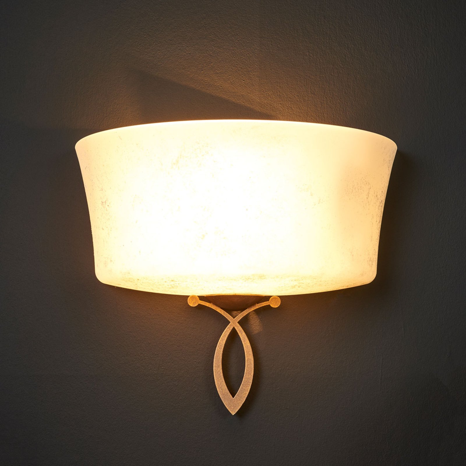 Alessio wall light in an uplighter design