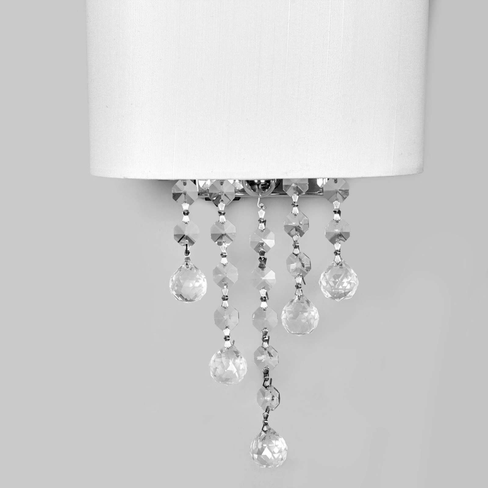 Nina wall light with a fabric lampshade