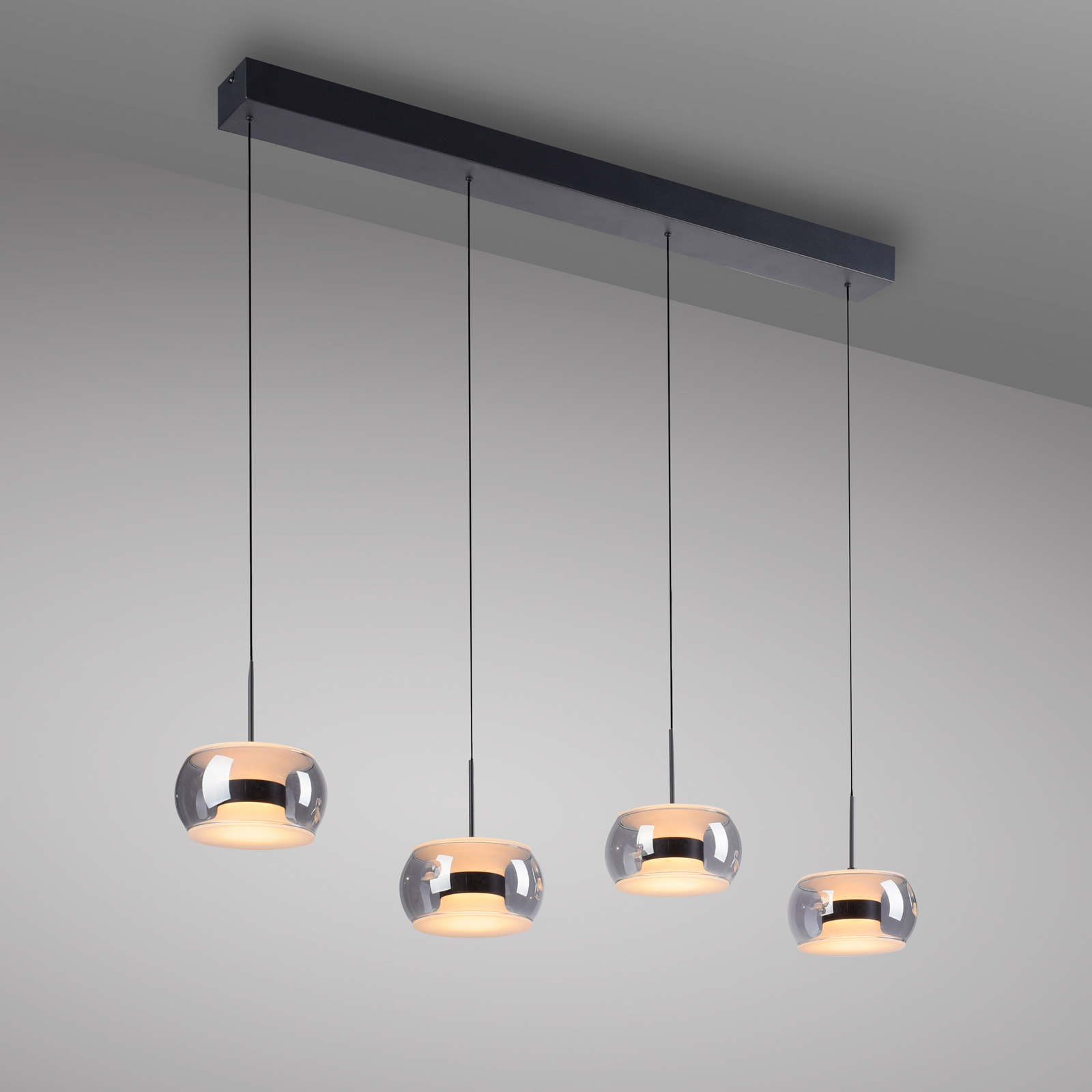 Fumea LED lógó lámpa, hossza 110 cm, fekete/füstös üveg, CCT, 4 izzós
