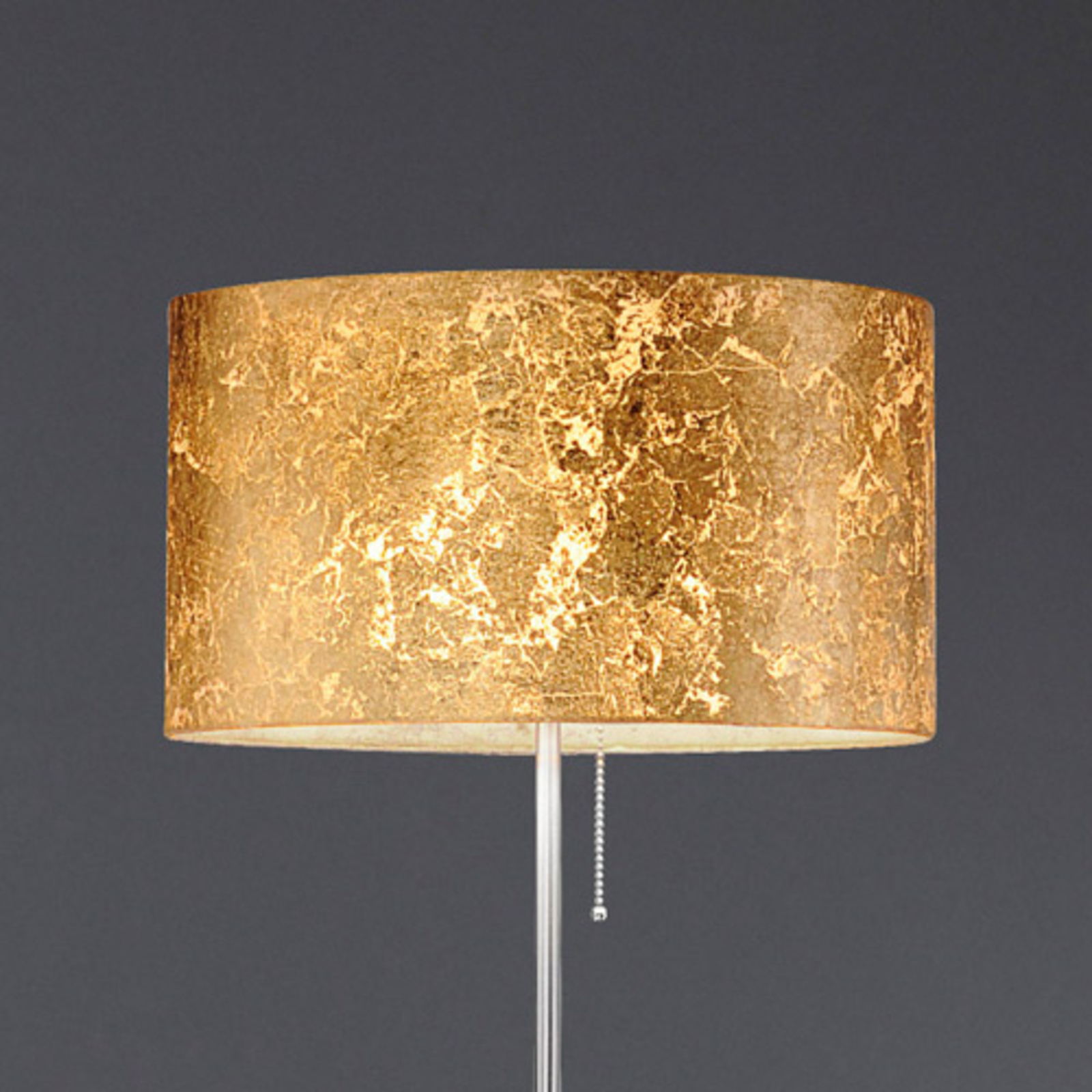 Alea Loop floor lamp with a gold leaf finish