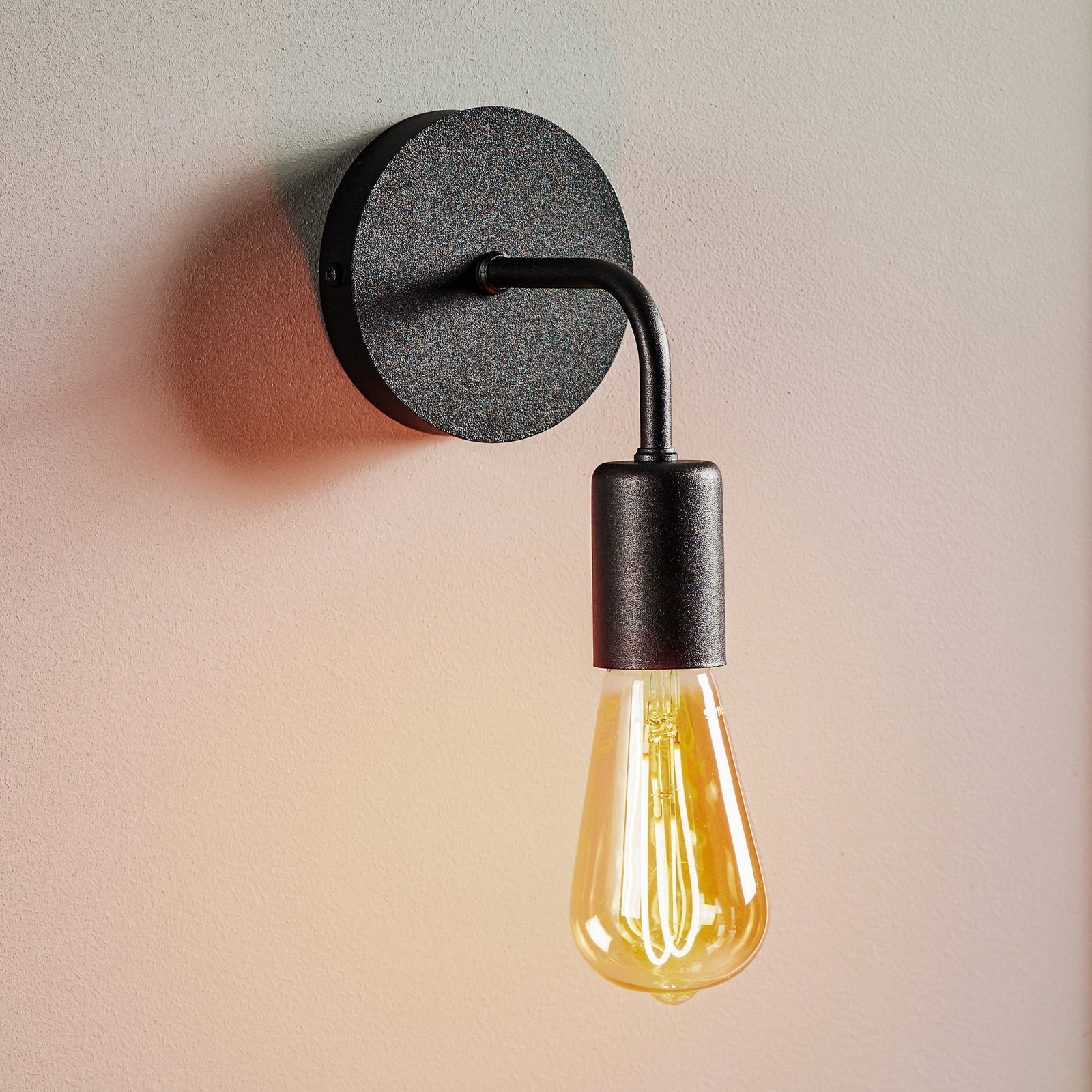 Atol wall light made of steel in black