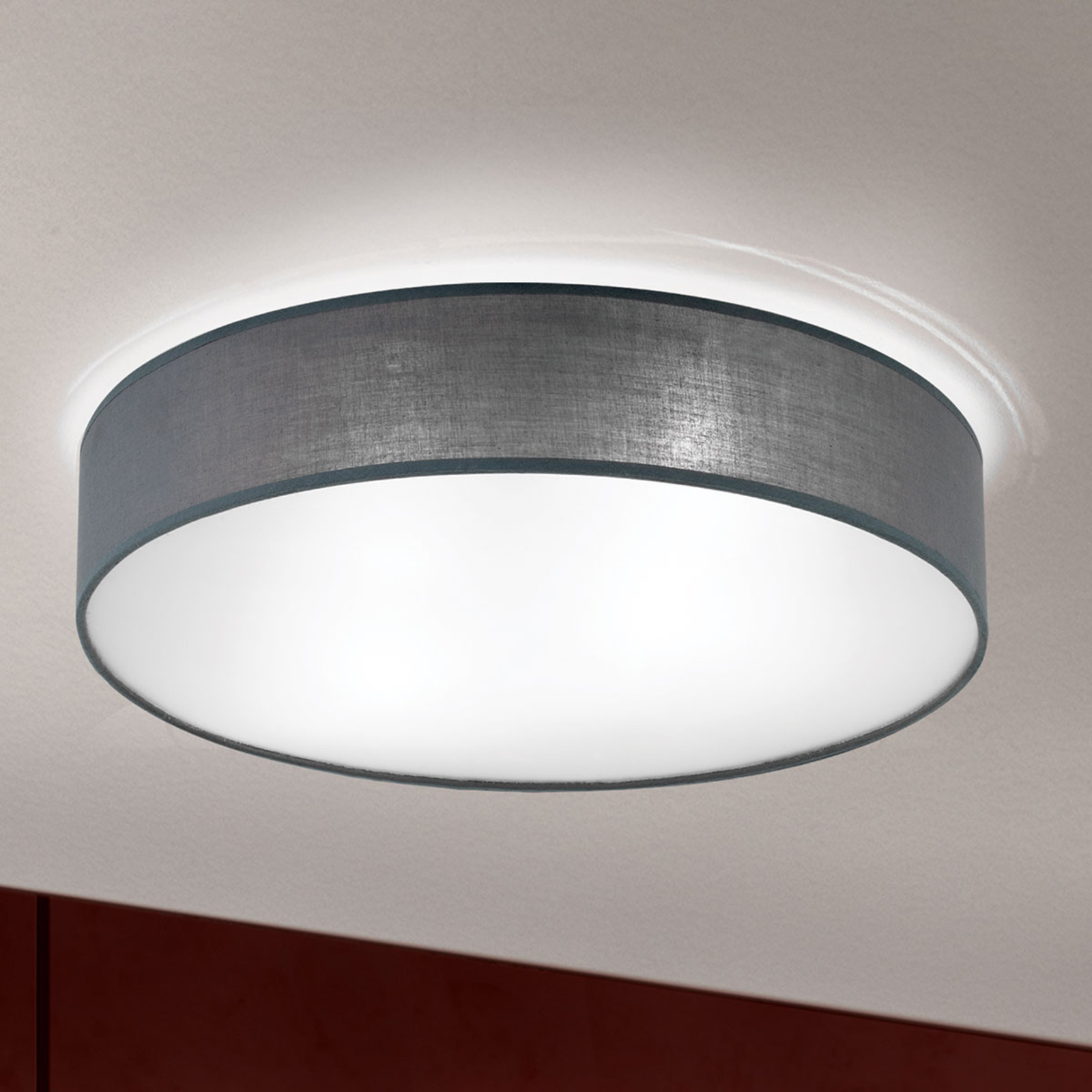 Grey Ufo ceiling light with a linen lampshade