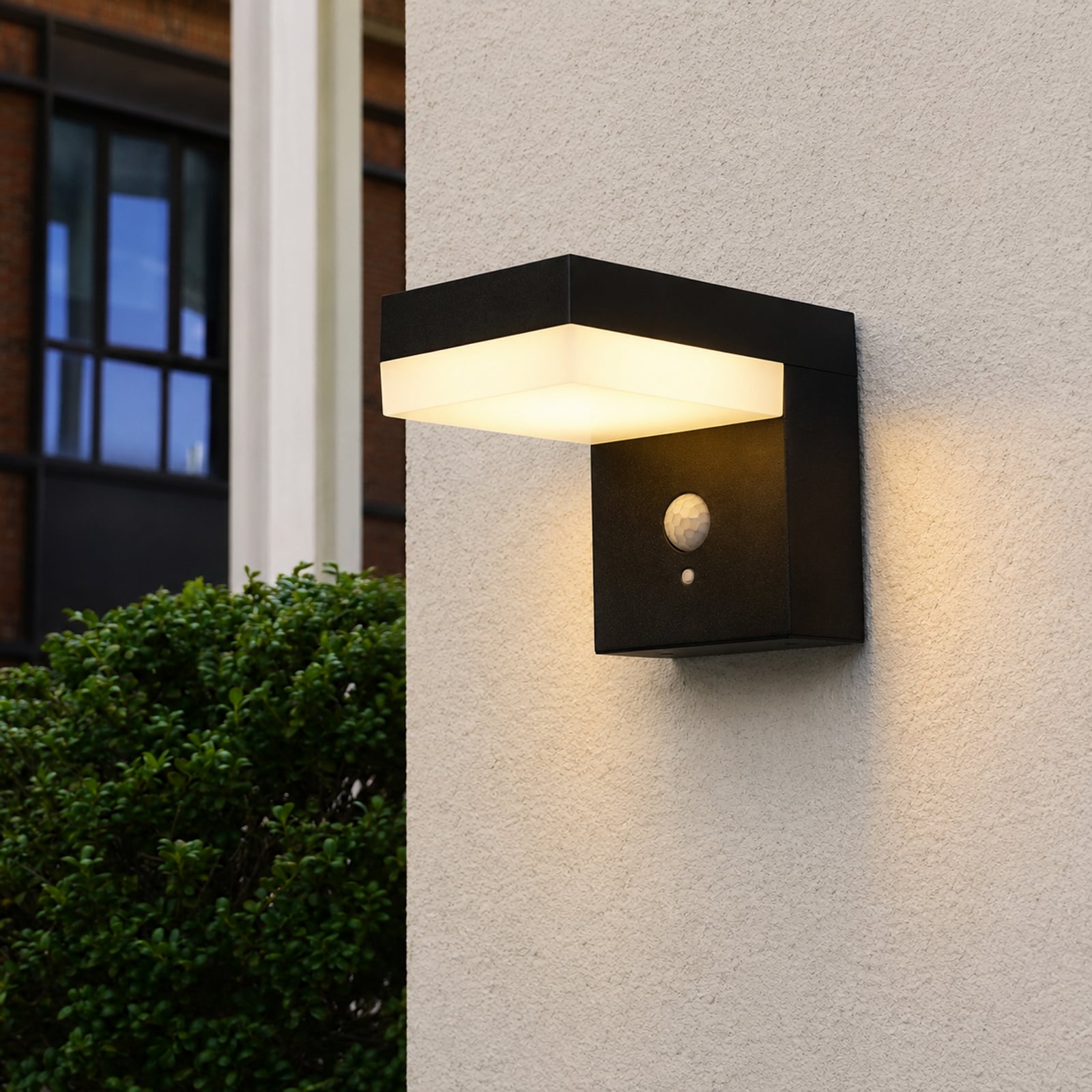 Cenova LED solar wall lamp, black, width 16 cm, sensor