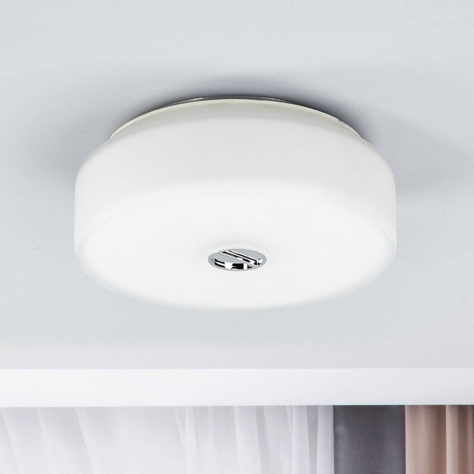 Lampa sufitowa FLOS Mini Button wykonana ze szkła