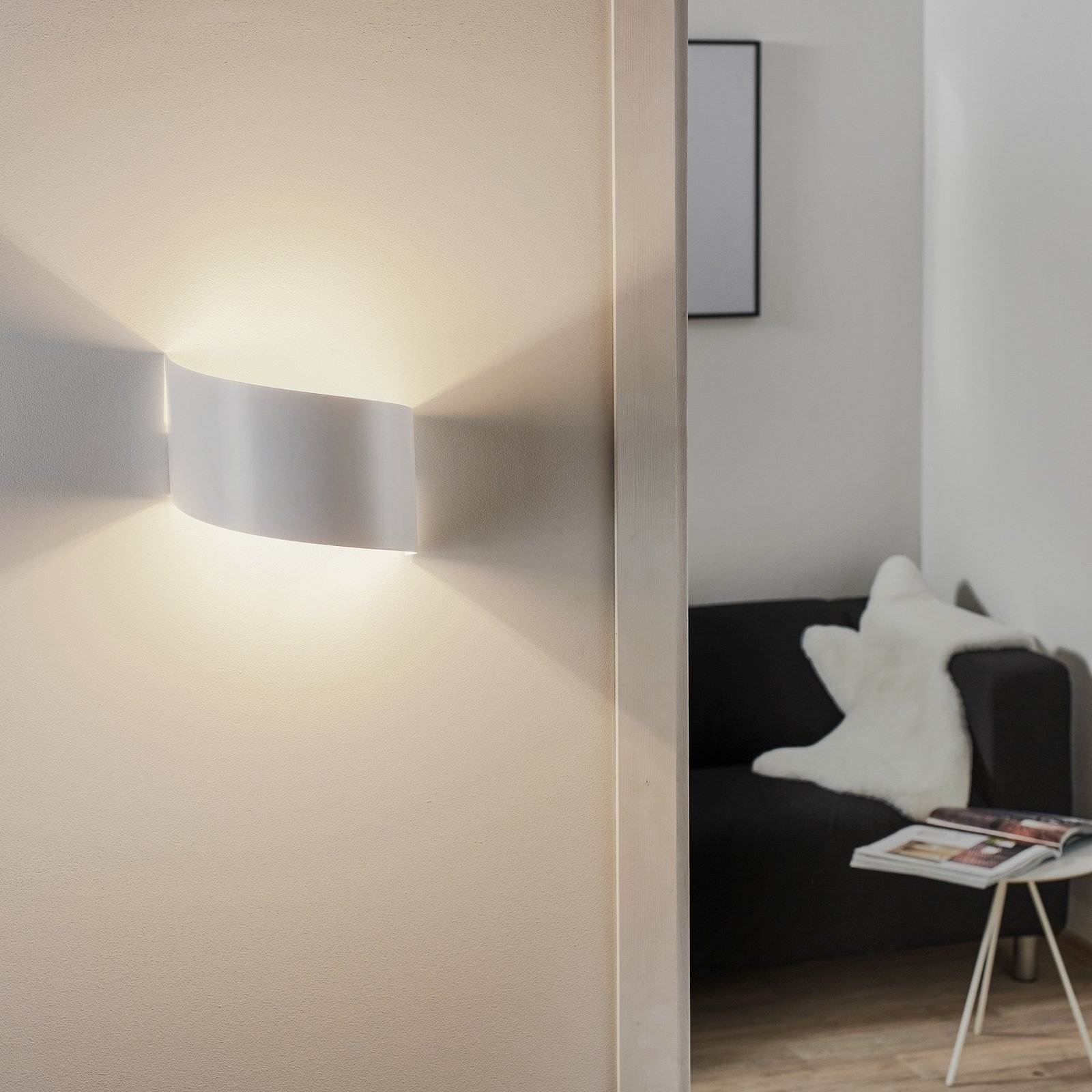 Vero wall light made of white painted steel