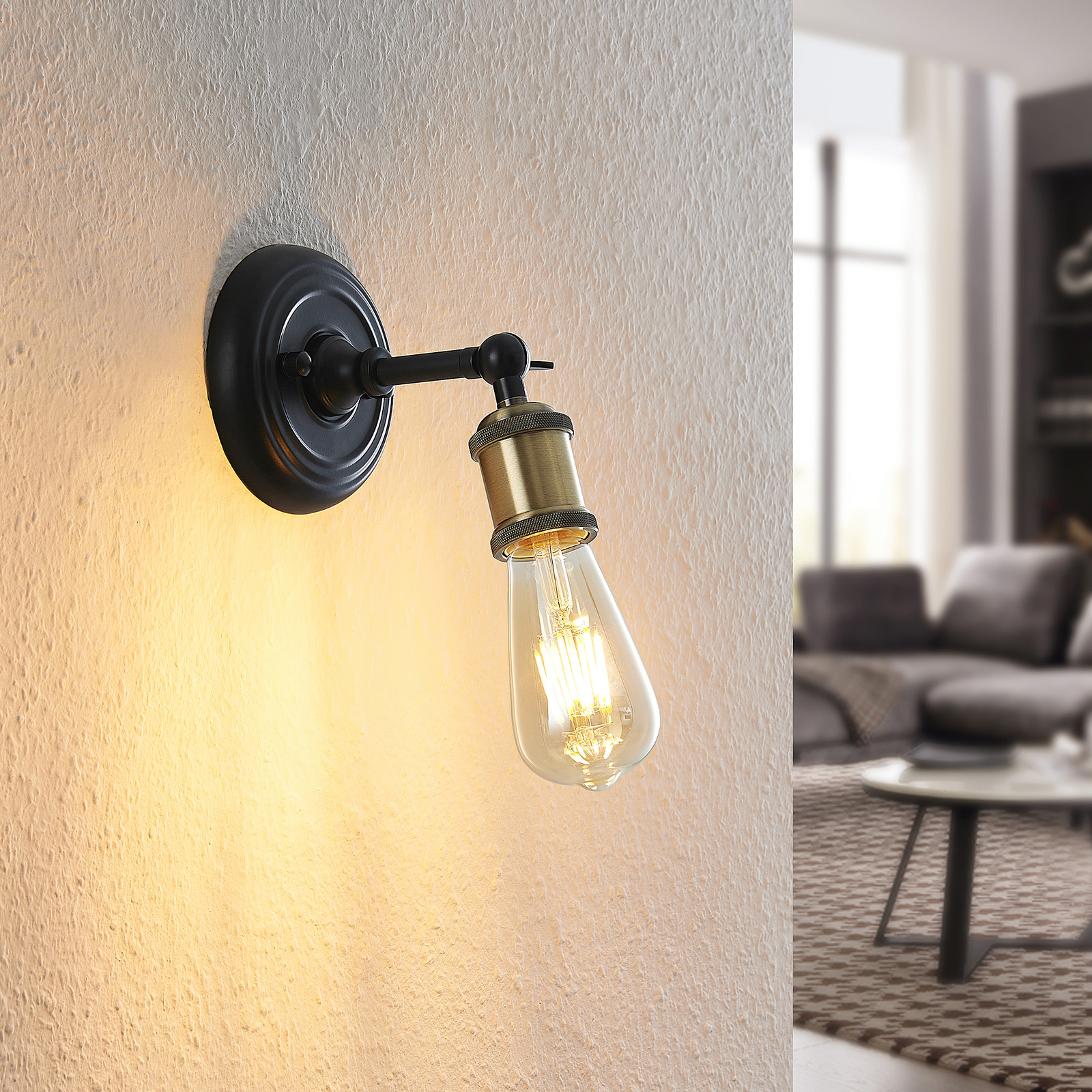 Lindby Aturia wall light in an antique design