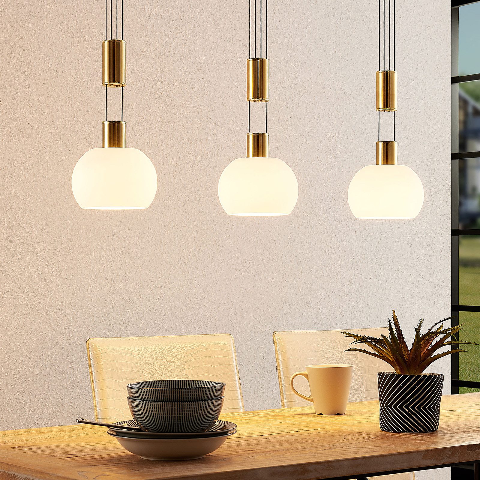 Aurell LED-Pendellampe, Glas, 3-fl.,messing