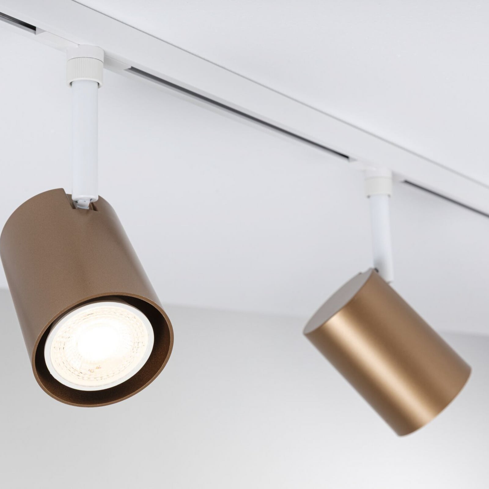 Paulmann URail tirni reflektor Luxe, zlato-bel, Ø 7 cm, GU10