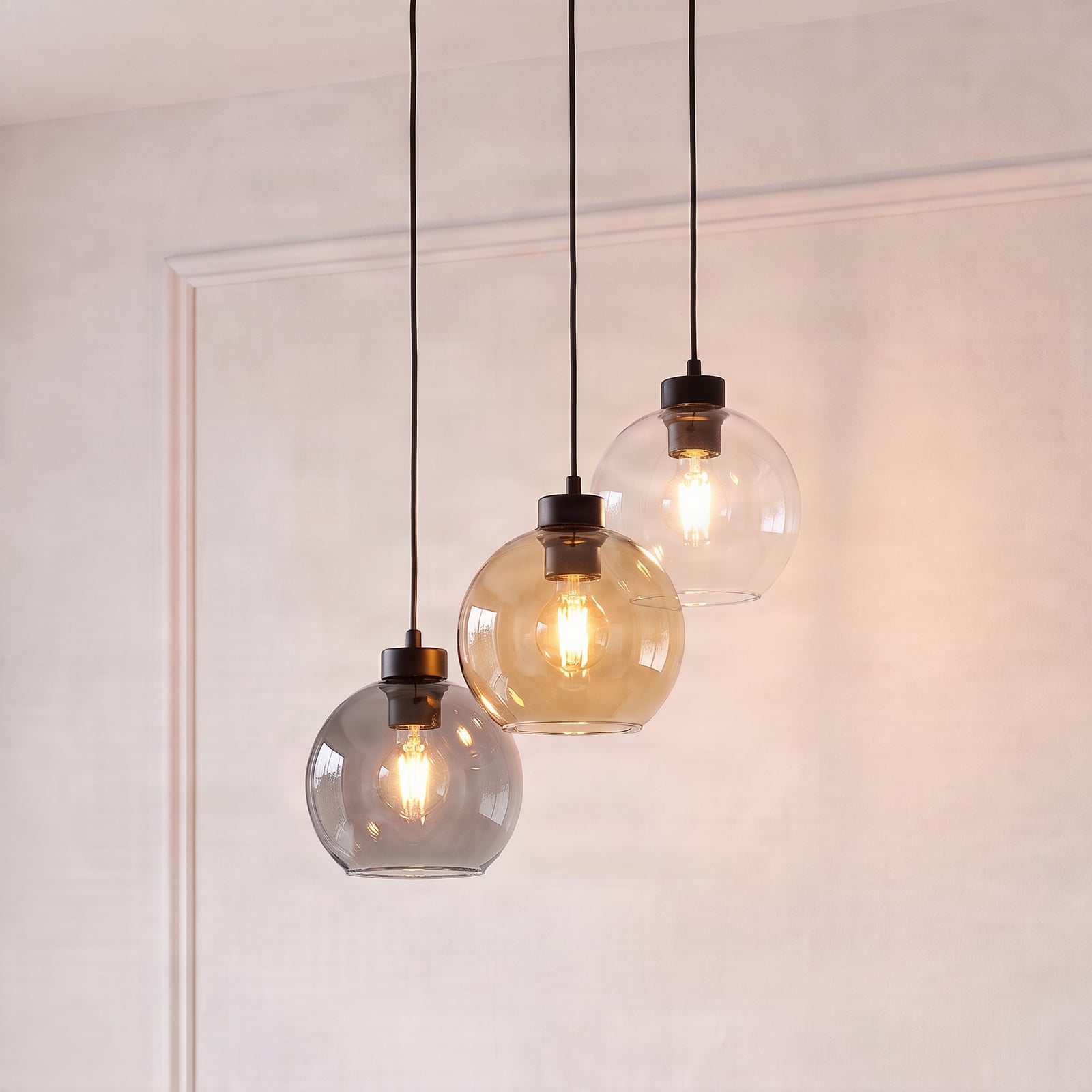 Lampada a sospensione Cubus Ø 50 cm a 3 luci, vetro trasparente/marrone miele Lampada a sospensione Cubus Ø 50 cm a 3 luci, vetro trasparente/marrone miele