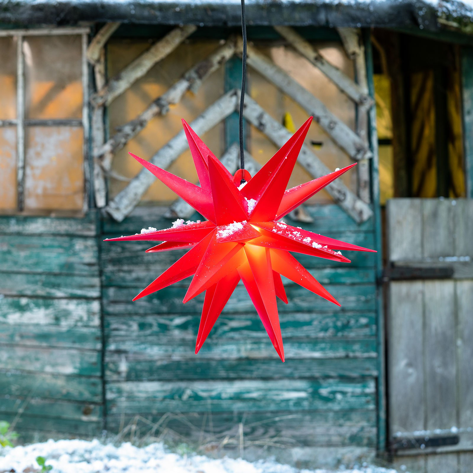 Estrela Ganesha de 18 pontas para exterior em vermelho