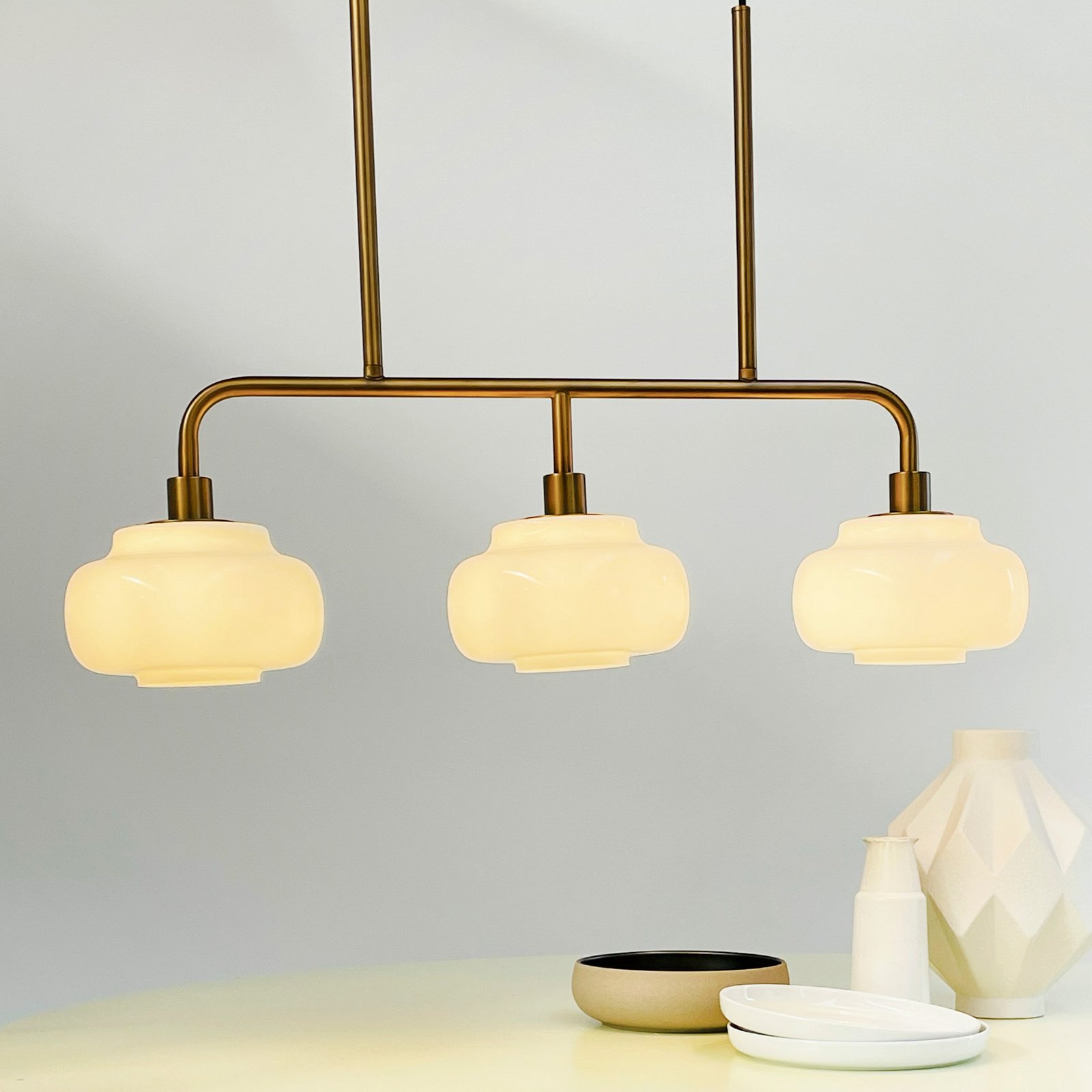 Viseća lampa Dyberg Larsen Ossett, brončana boja, duljina 80 cm