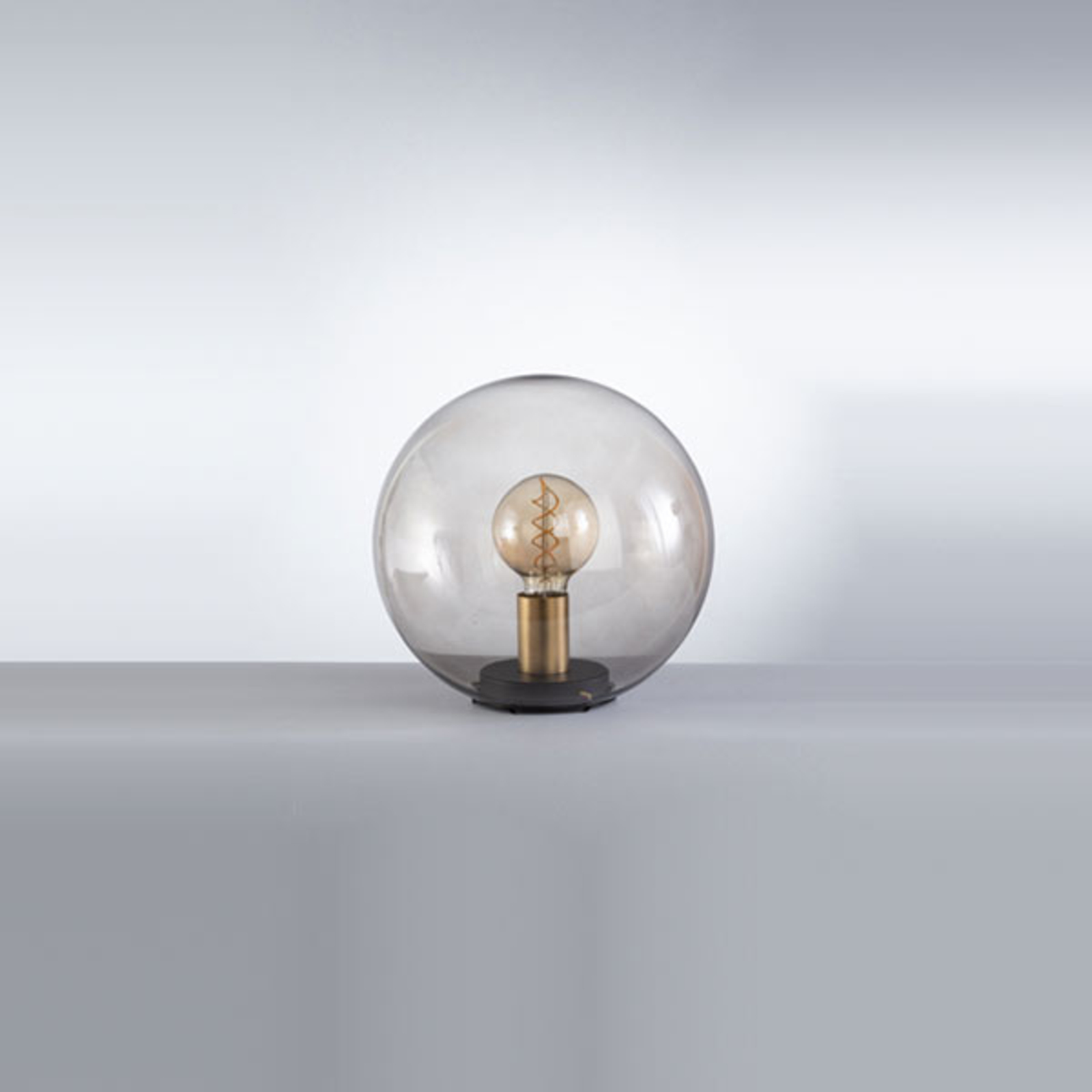 Dini table lamp with spherical glass shade