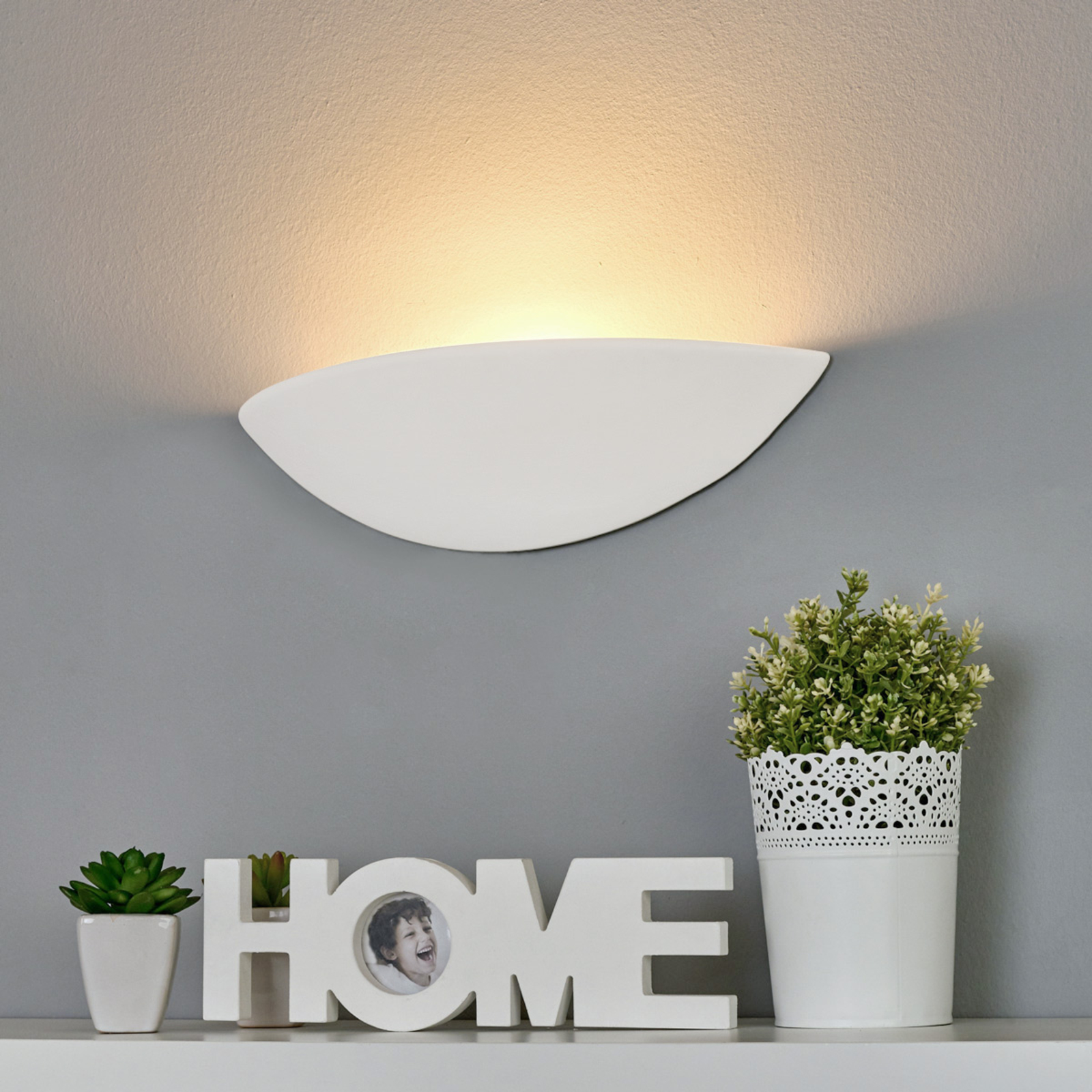 Pale plaster wall light, paintable Lights.co.uk