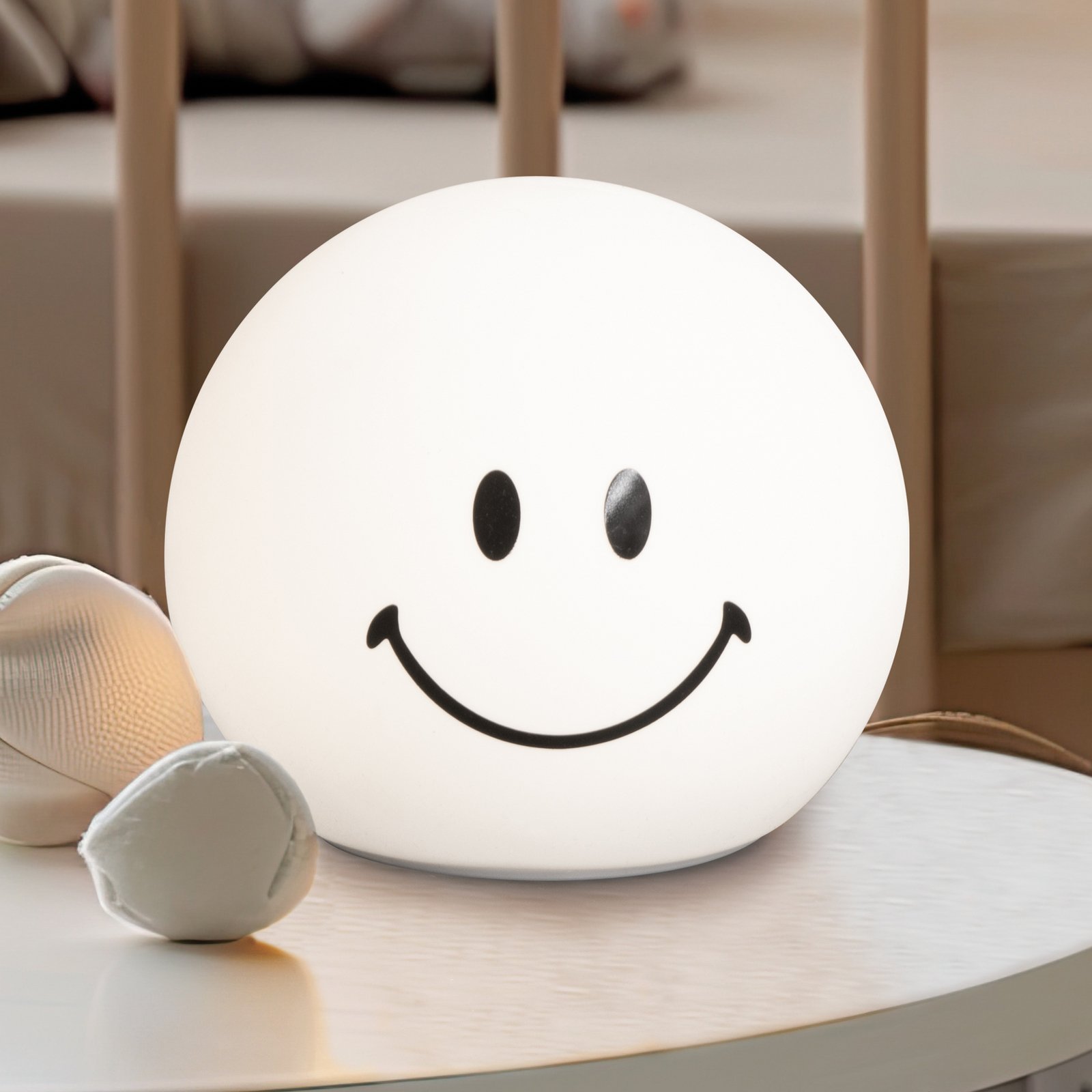 Lampă LED cu baterie Smiley, albă, Ø 13 cm, silicon