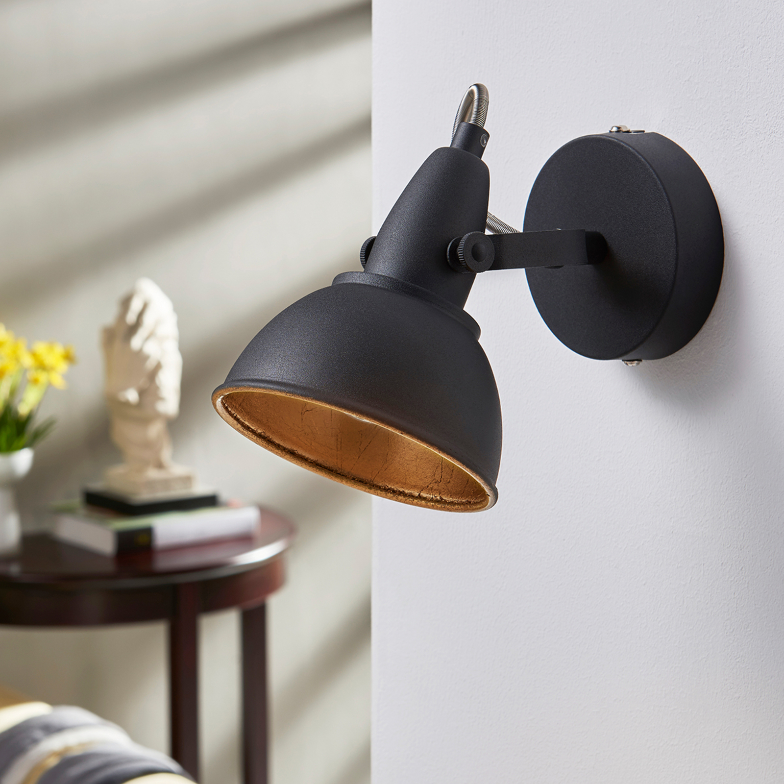 Black and gold wall light Julin Lights.co.uk