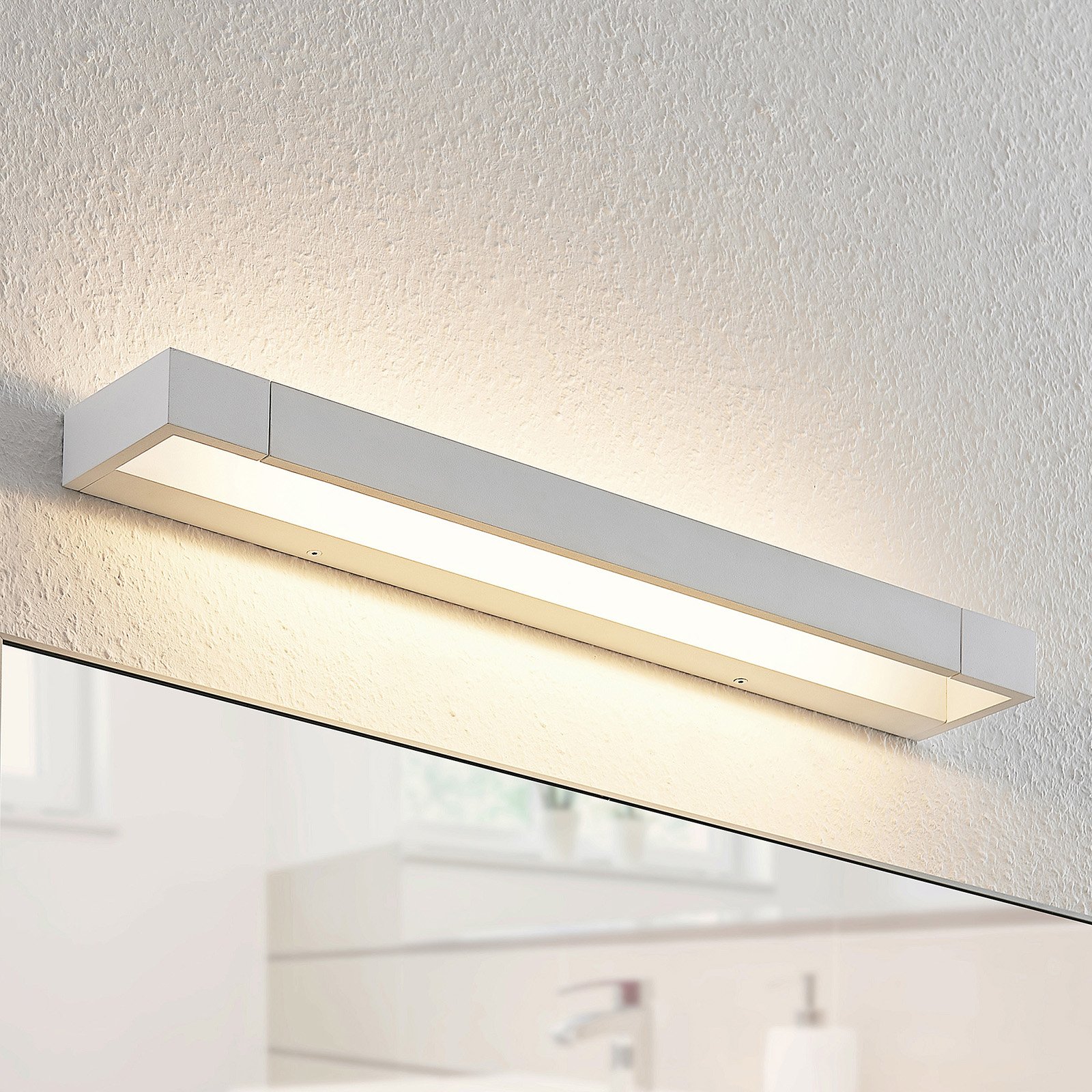 Arcchio Jora applique LED, IP44, bianco, 60 cm