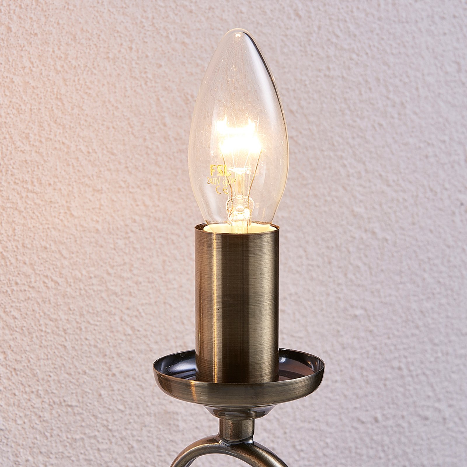 Elegante wandlamp Marnia in oud messing