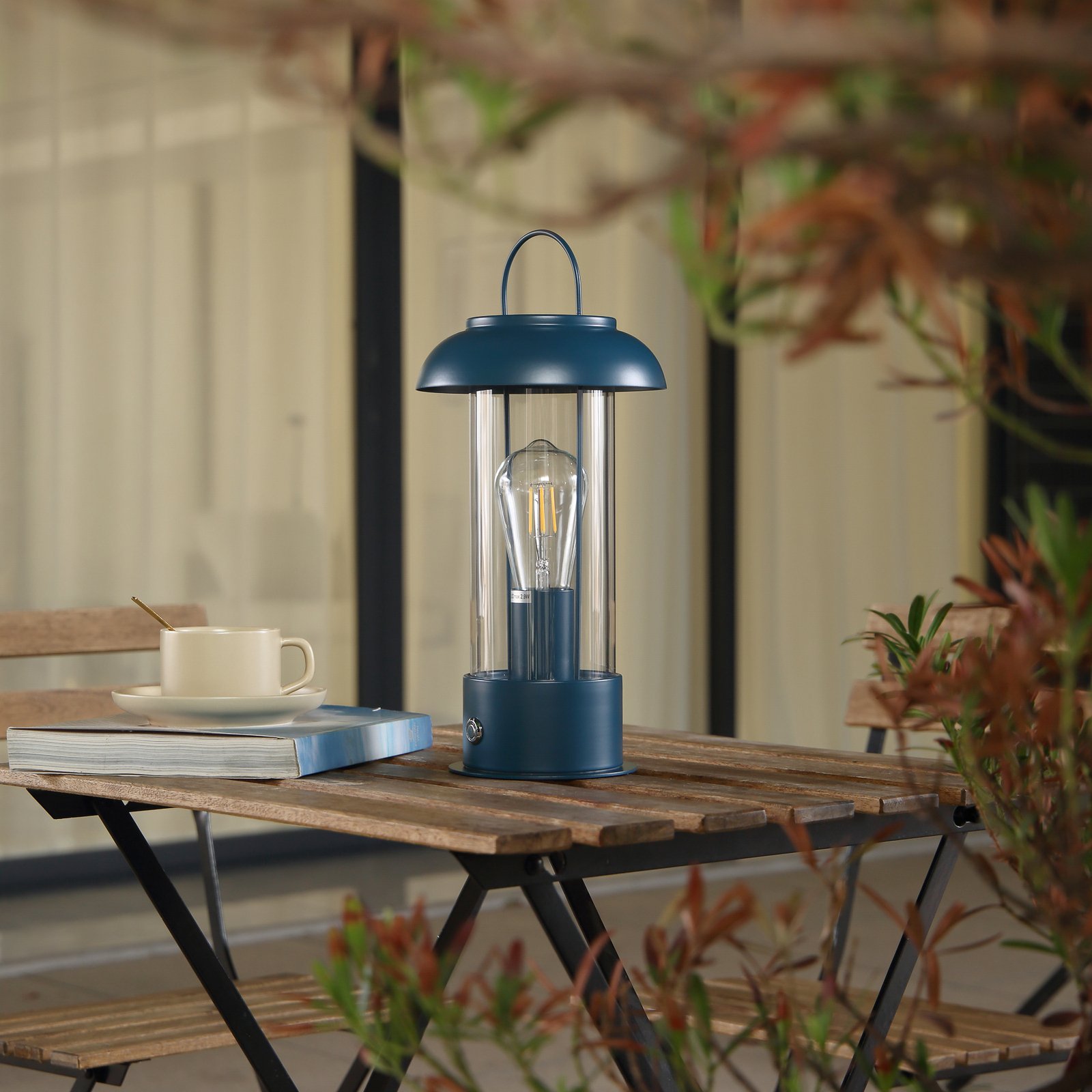 Akumulatorowa lampa stołowa Lindby Yvette, niebieska, IP44, ściemniacz