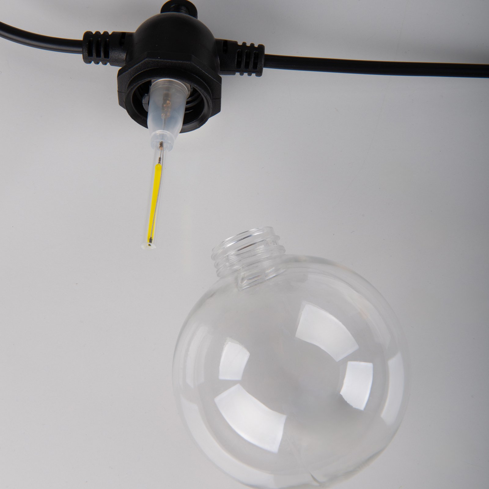 LED-Solar-Lichterkette CADENA, 2.500 K, schwarz 10-flg. 10 m
