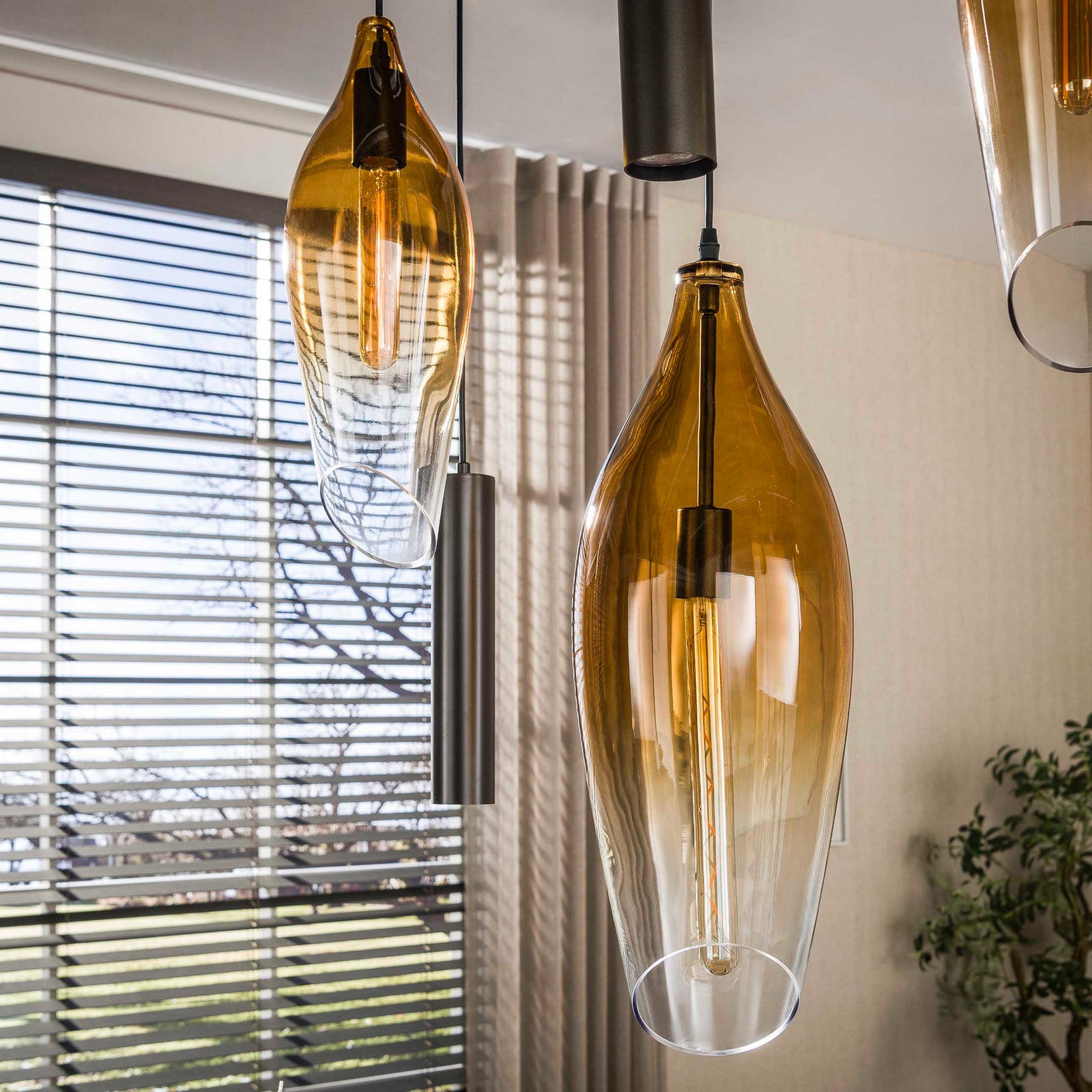 Pendelleuchte Cocoon, amber, Glas, 7-flg., E27, GU10 Pendelleuchte Cocoon, amber, Glas, 7-flg., E27, GU10