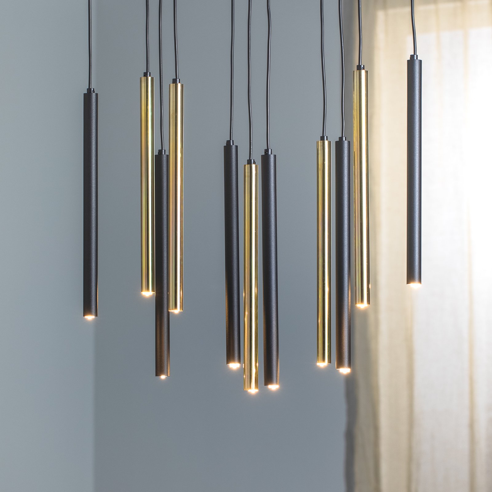 Monza pendant light, black/gold, 11-bulb