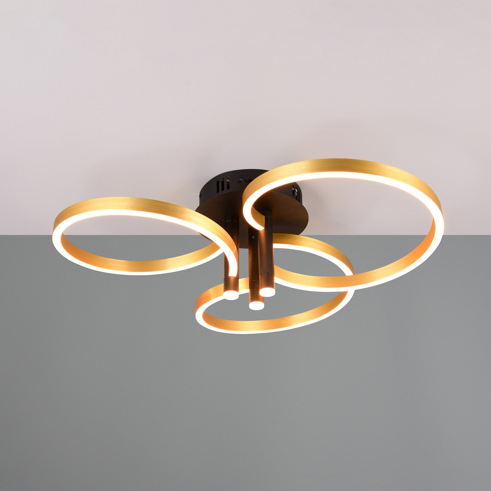 Trio Lighting Plafonieră LED Caruso auriu/negru Ø 66 cm metal CCT dim - Camera de zi / sufragerie - modern - auriu negru