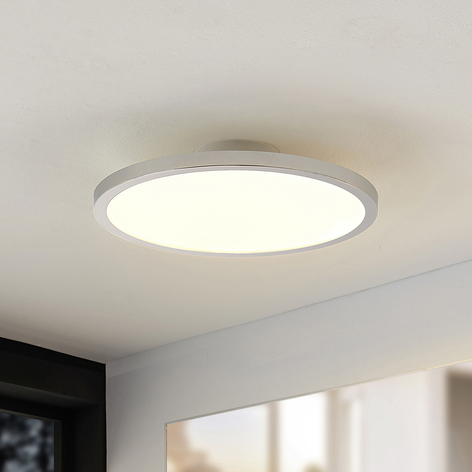 Lindby Skrolla LED-vägglampa för badrum, krom rund