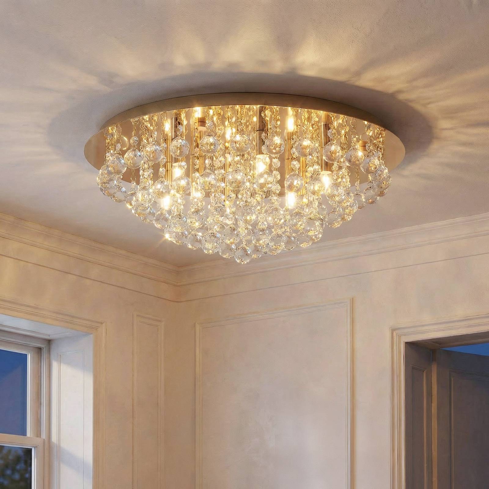 Lindby plafondlamp Gillion, 8-lamps, goud, kristal, Ø 55cm