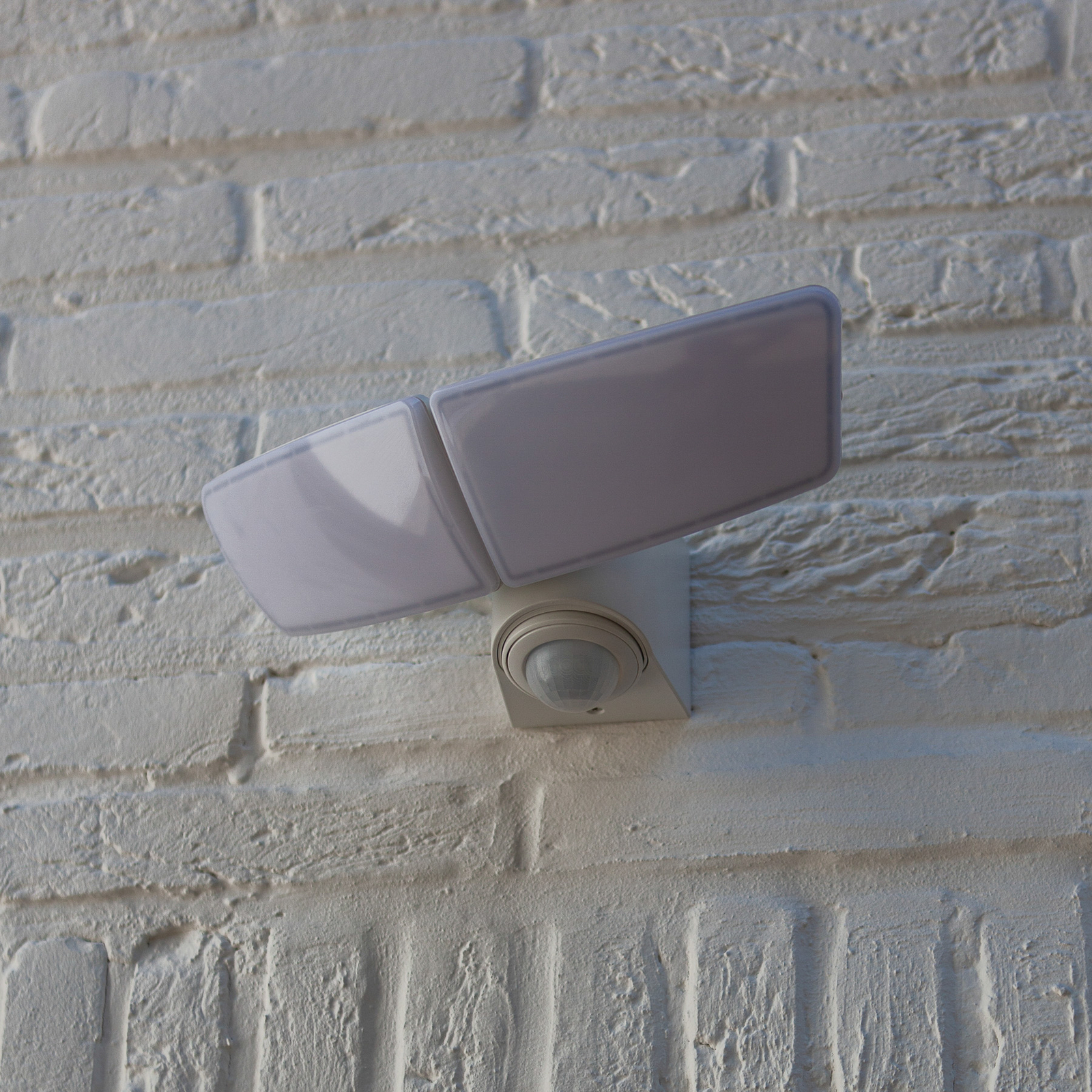 Artica LED outdoor wall light white with a sensor