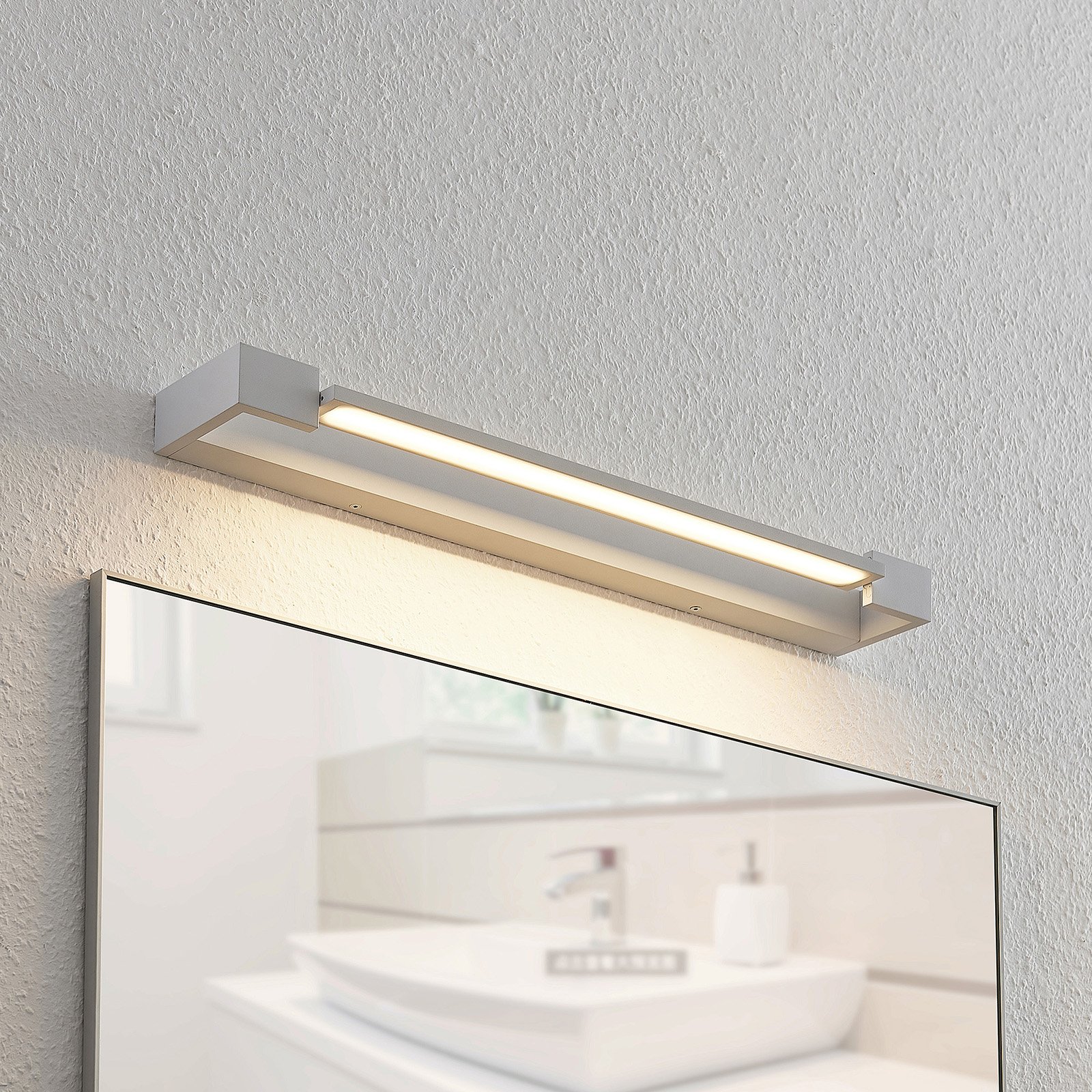 Arcchio Jora applique LED, IP44, bianco, 60 cm