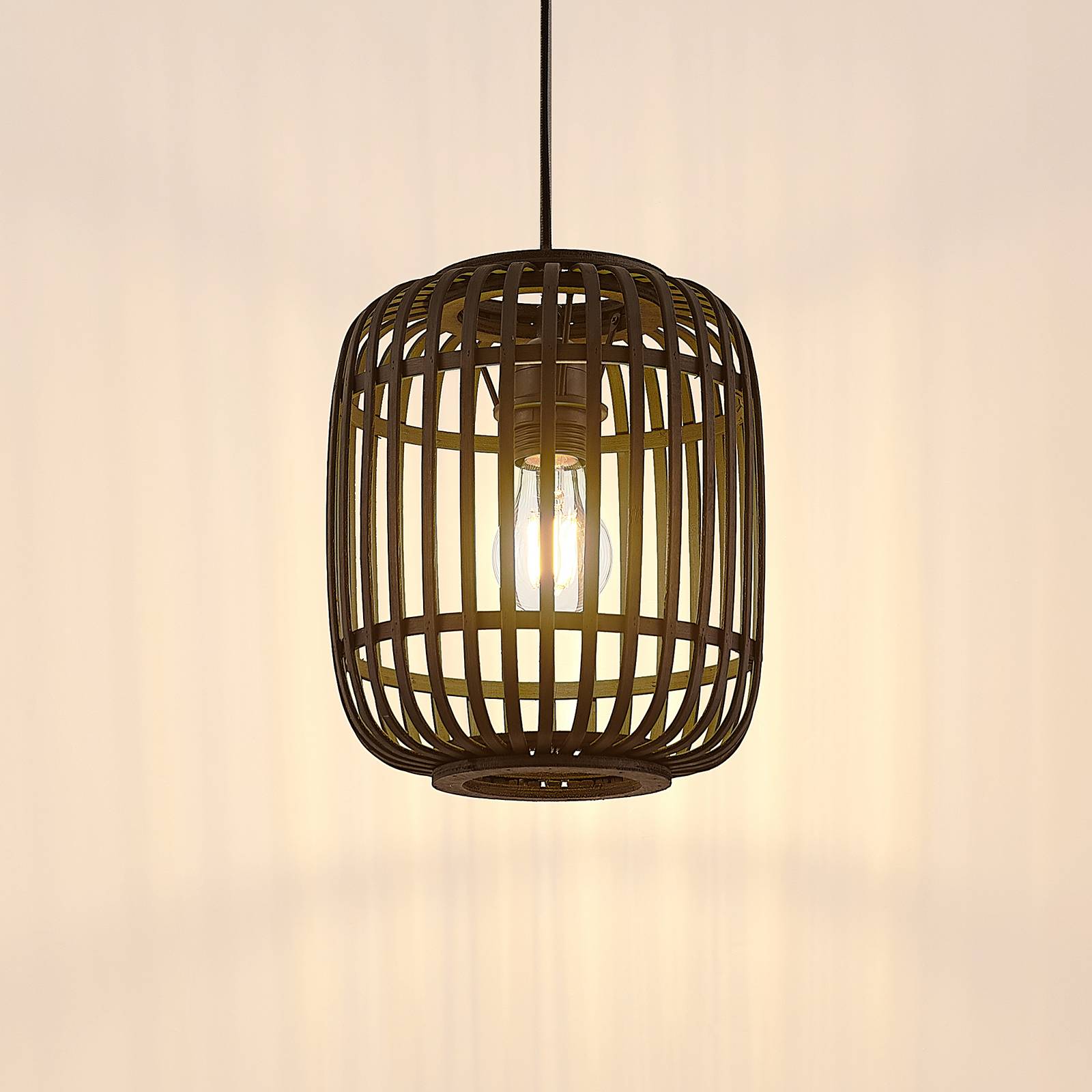 Lampa wisząca Lindby Canyana, czarna, rattan, Ø 22 cm