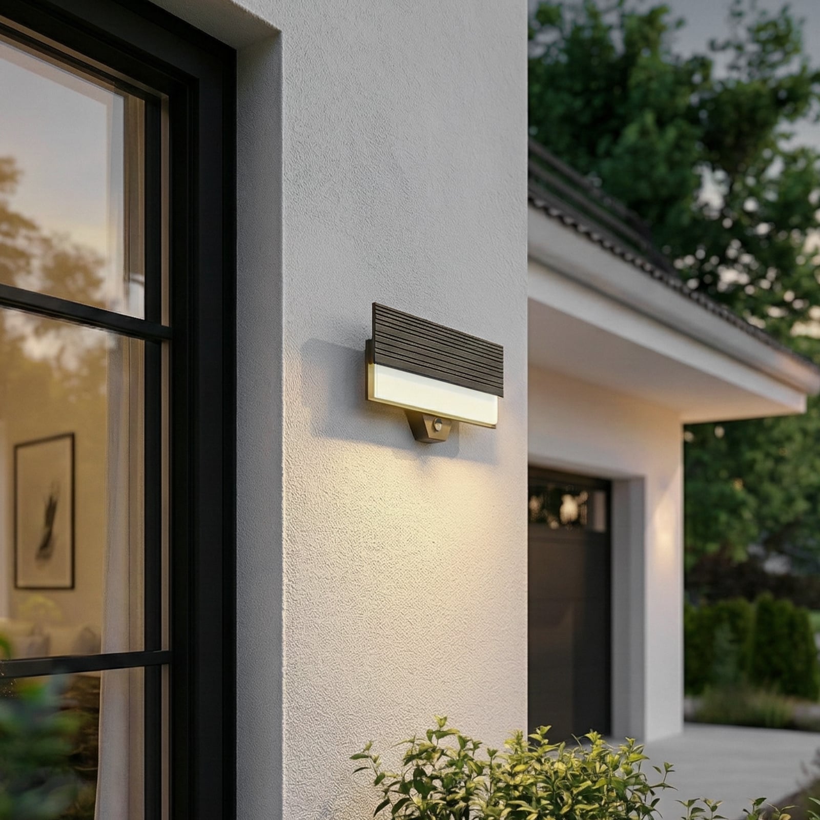 Lucande LED-Außenwandleuchte Melira, Sensor, anthrazit, IP65 Lucande LED-Außenwandleuchte Melira, Sensor, anthrazit, IP65