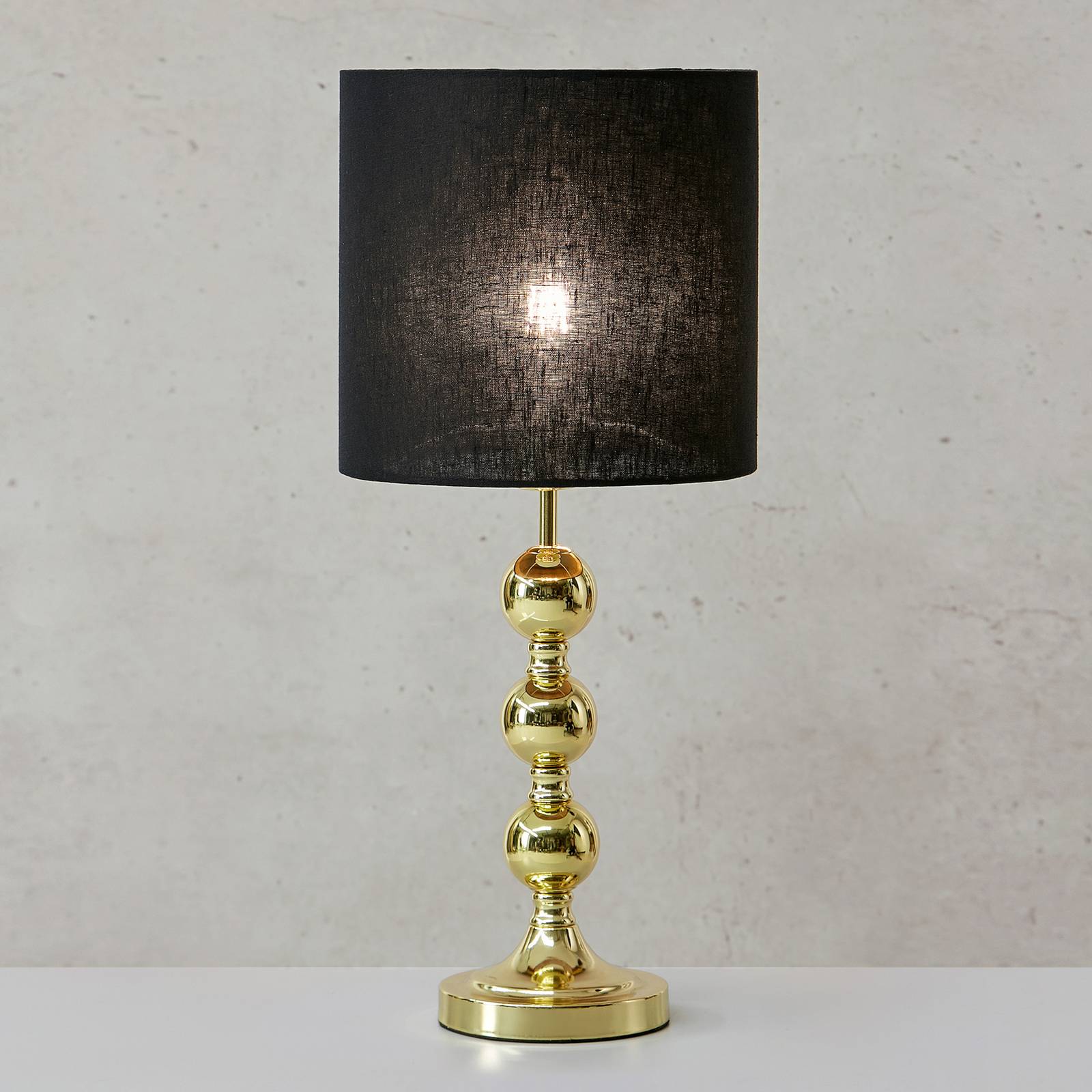 Image of Markslöjd Lampe à poser Octo abat-jour en tissu, laiton/noir 7330024609204