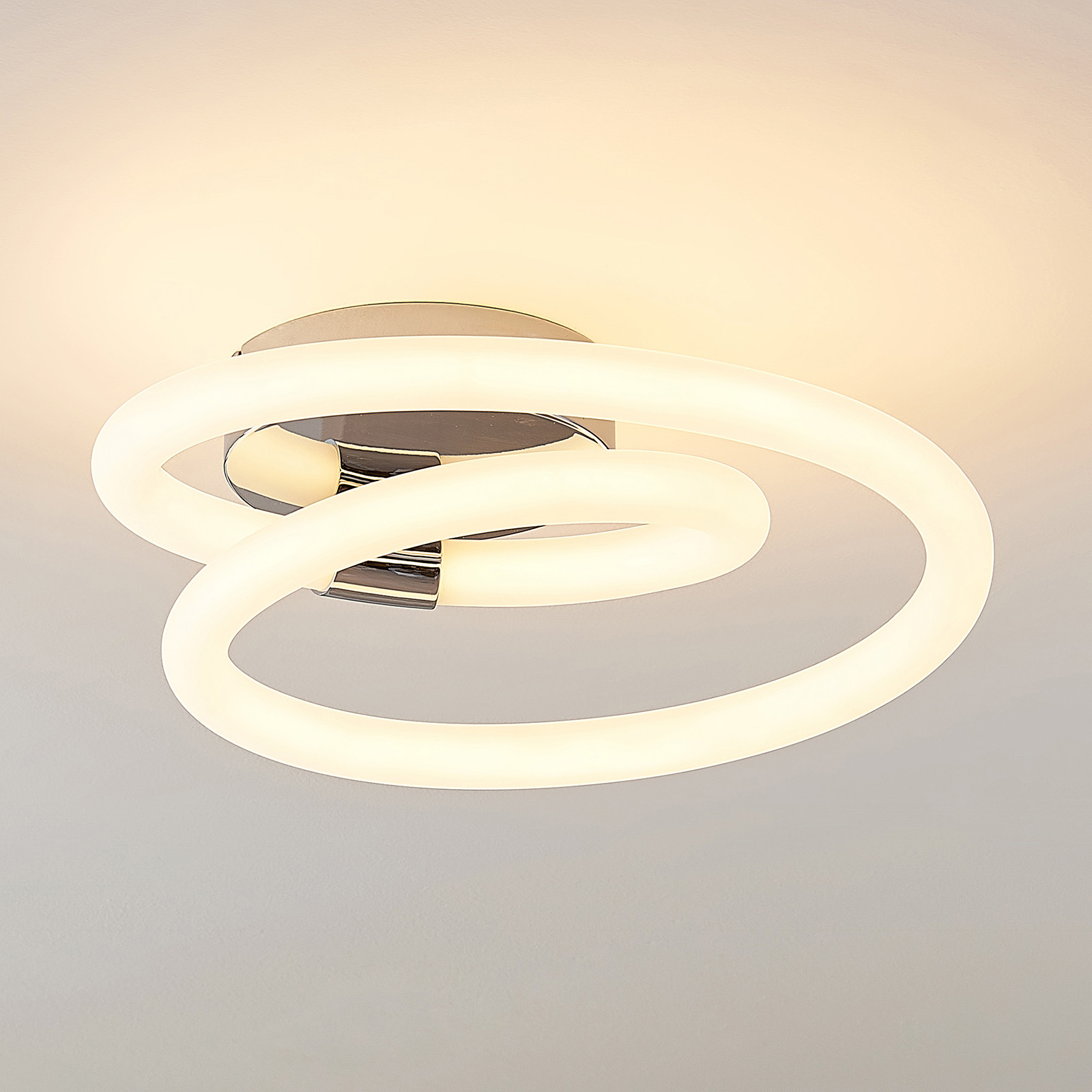 Lucande Lumka LED wall lamp in chrome, for Living / Dining Room, stainless steel, plastic, 18 W, energy efficiency: A+