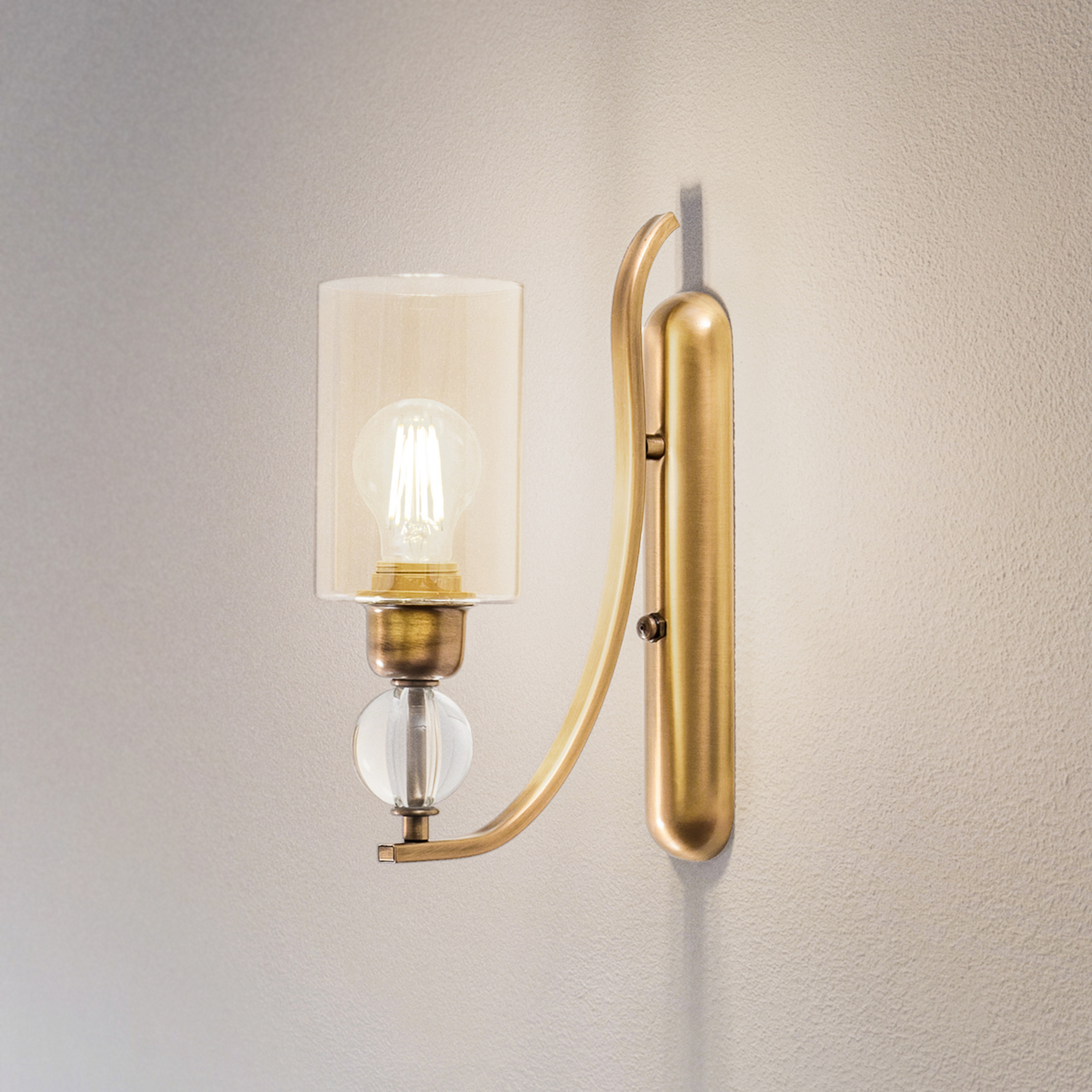 Applique Jadina, oro antico, altezza 32 cm, metallo/vetro