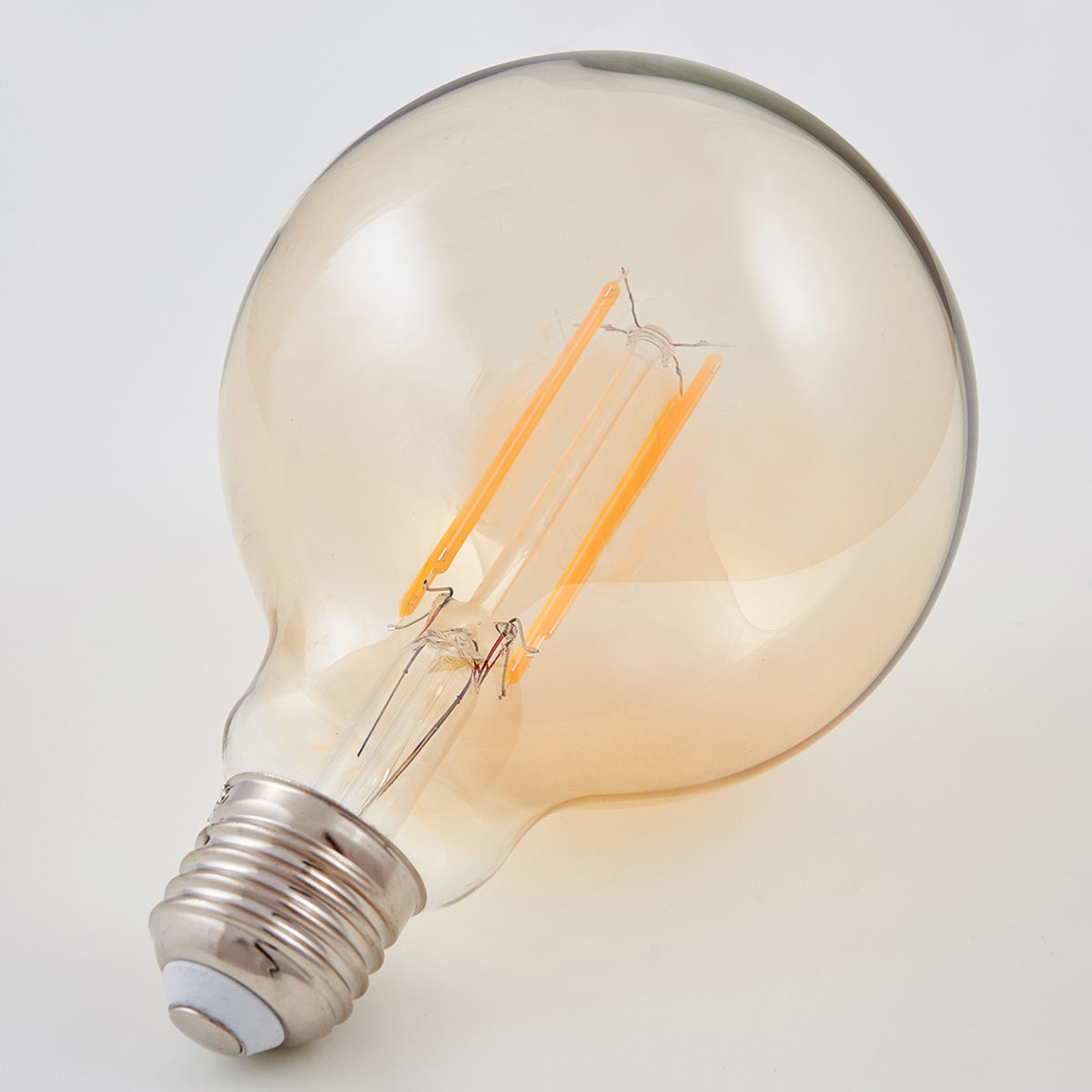 E27 LED globe bulb Filament 6W 500lm, amber 1,800K