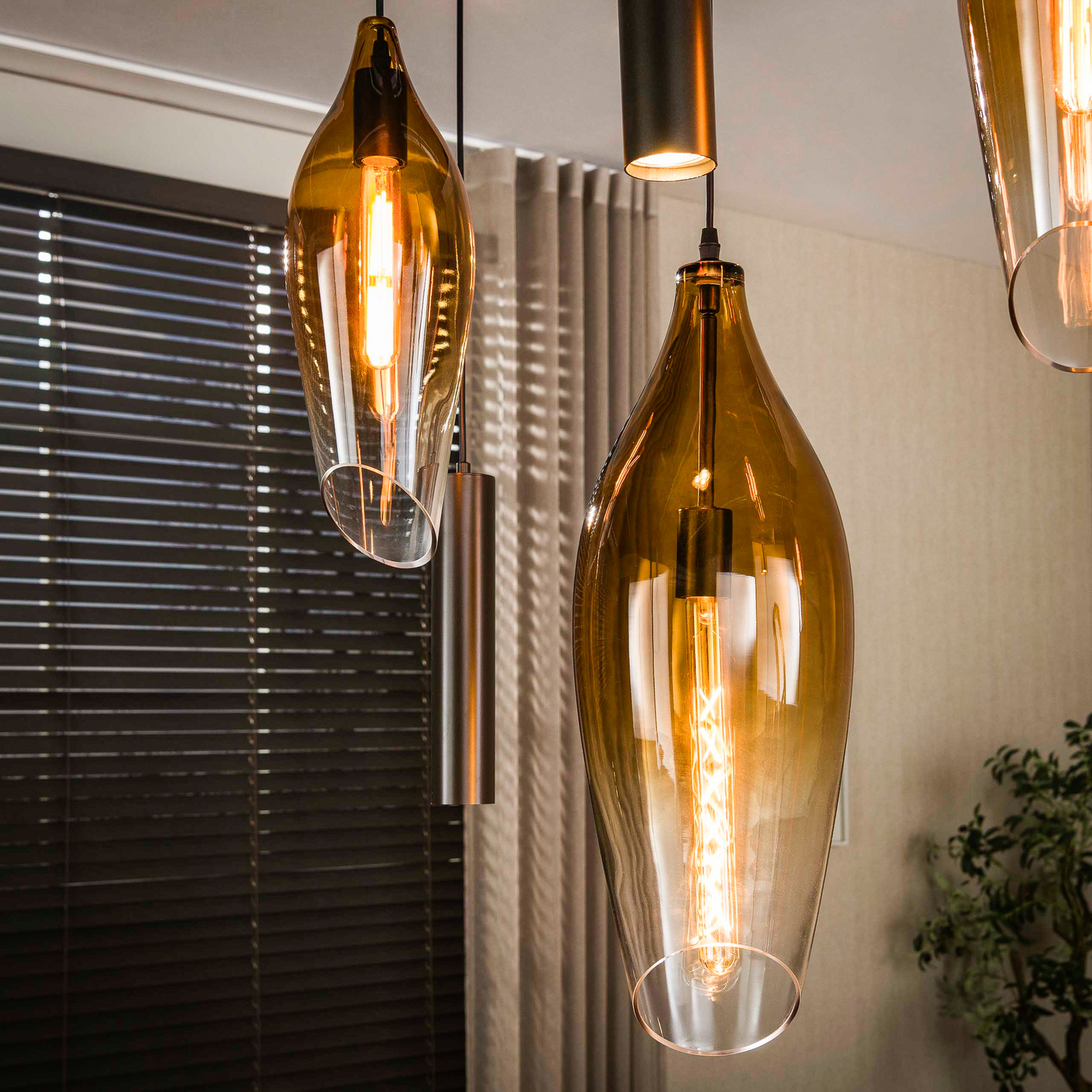 Pendelleuchte Cocoon, amber, Glas, 7-flg., E27, GU10 Pendelleuchte Cocoon, amber, Glas, 7-flg., E27, GU10