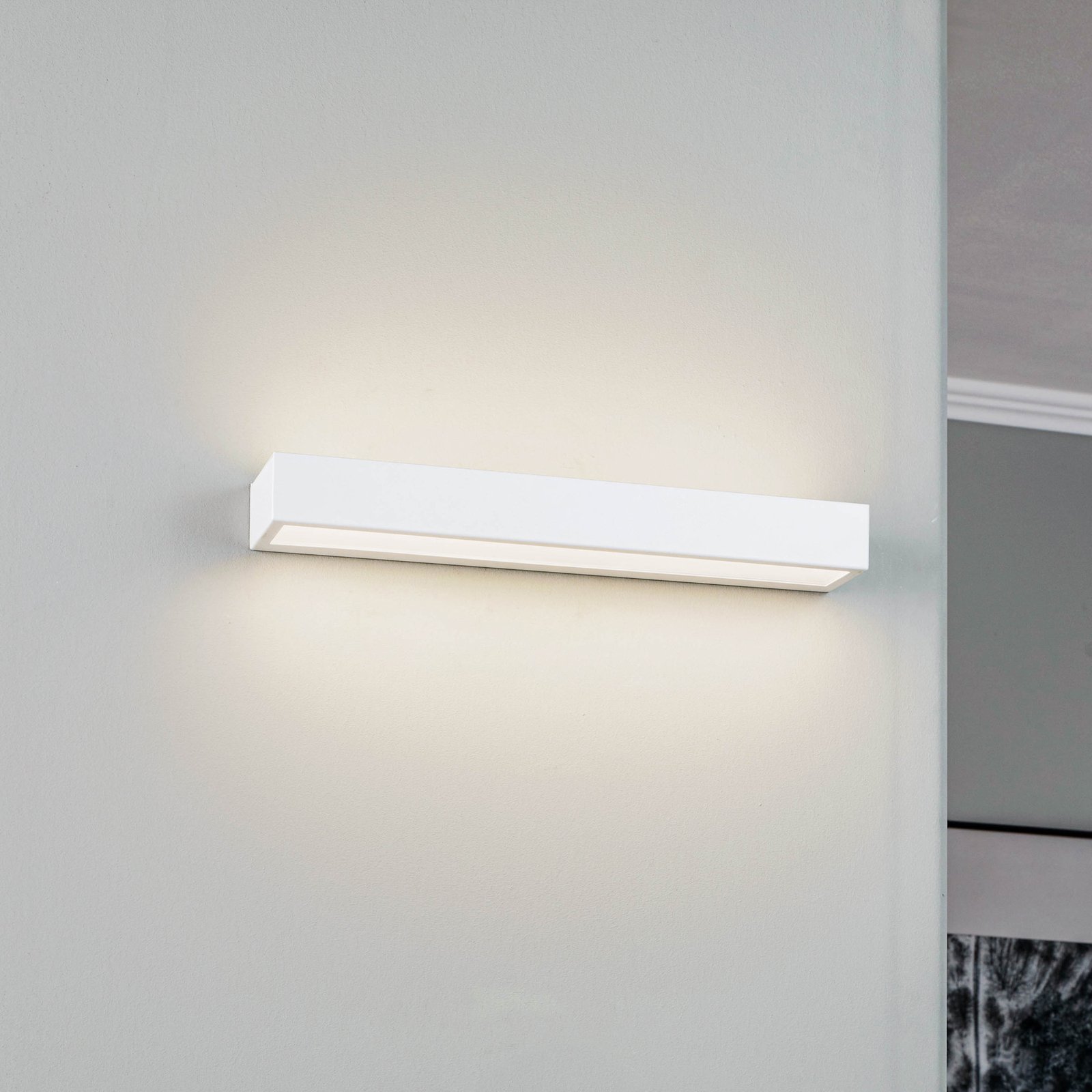 LED wall light Mera, width 40 cm, white