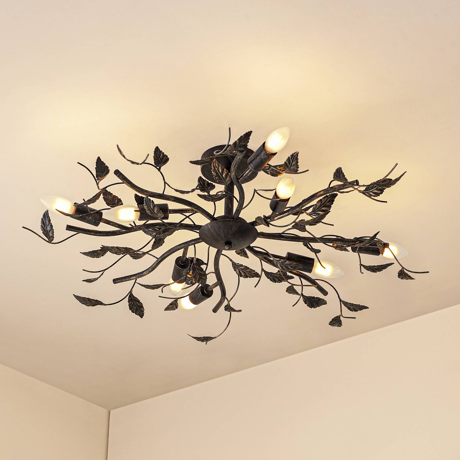 Lindby Deckenlampe Yos, 8-flg., 85 cm, schwarz-kupfer, E14 günstig online kaufen