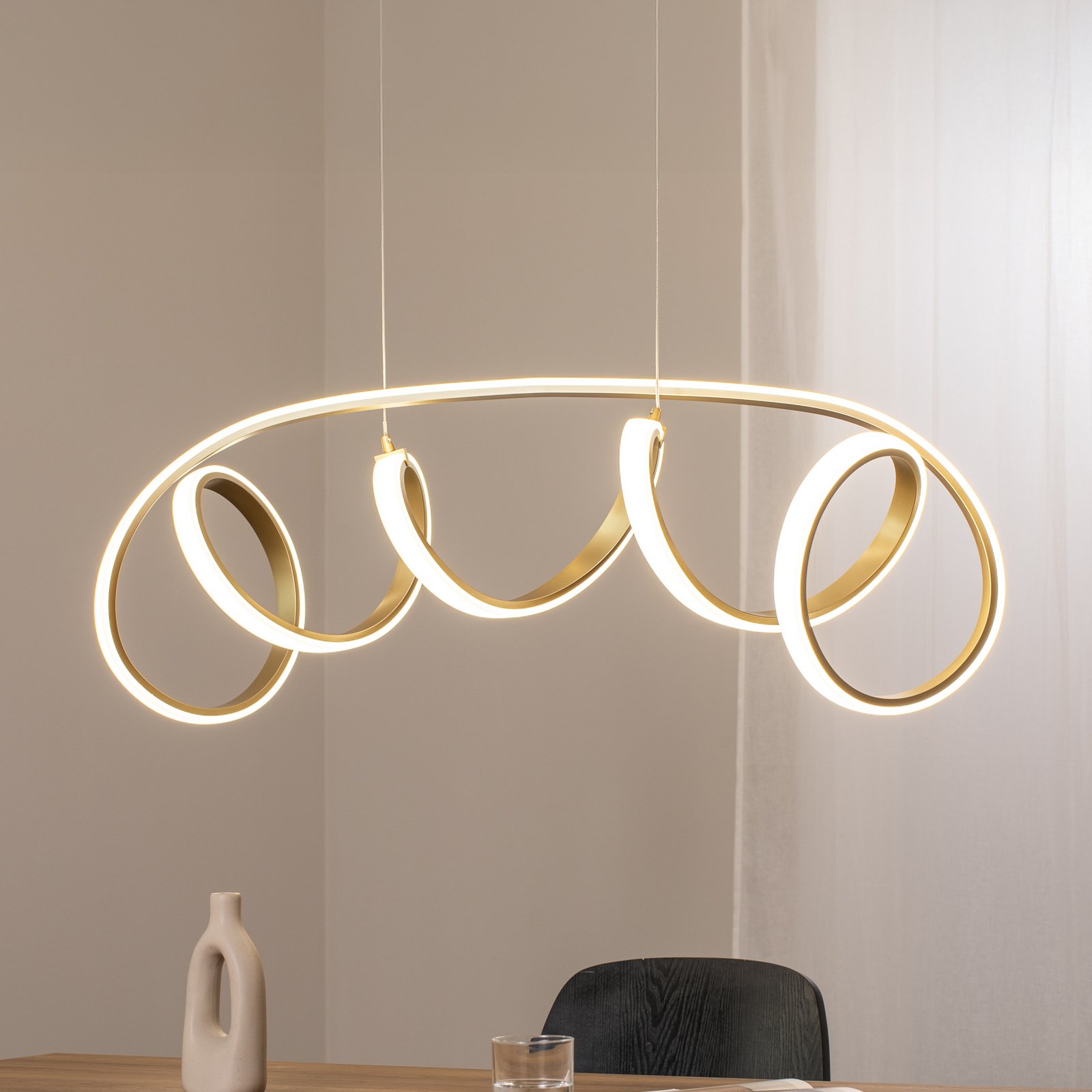 Kira LED pendant light, gold-coloured, length 102 cm, 4000 K