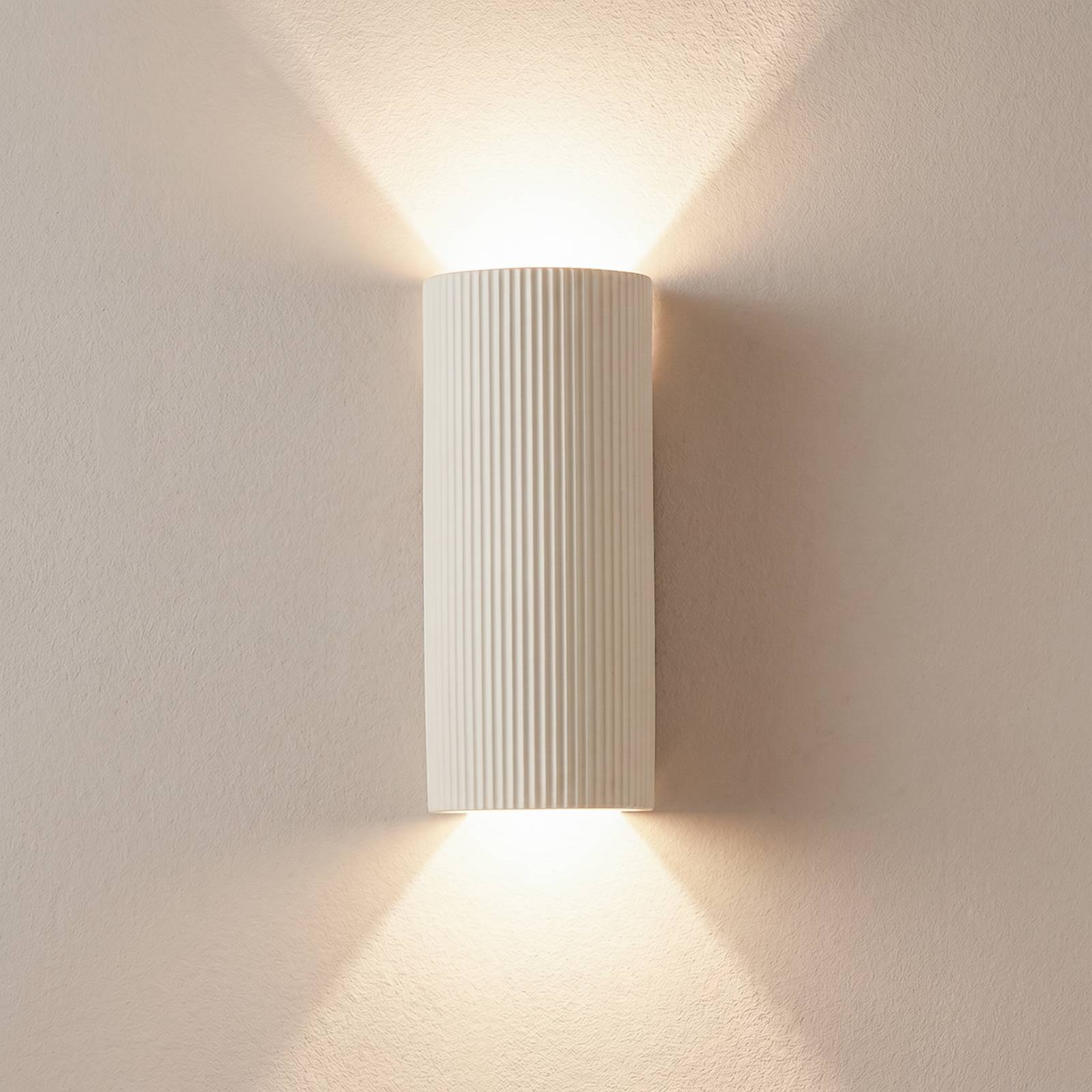 Applique murale Lindby Colja, ronde, hauteur 30,5 cm, plâtre, beige